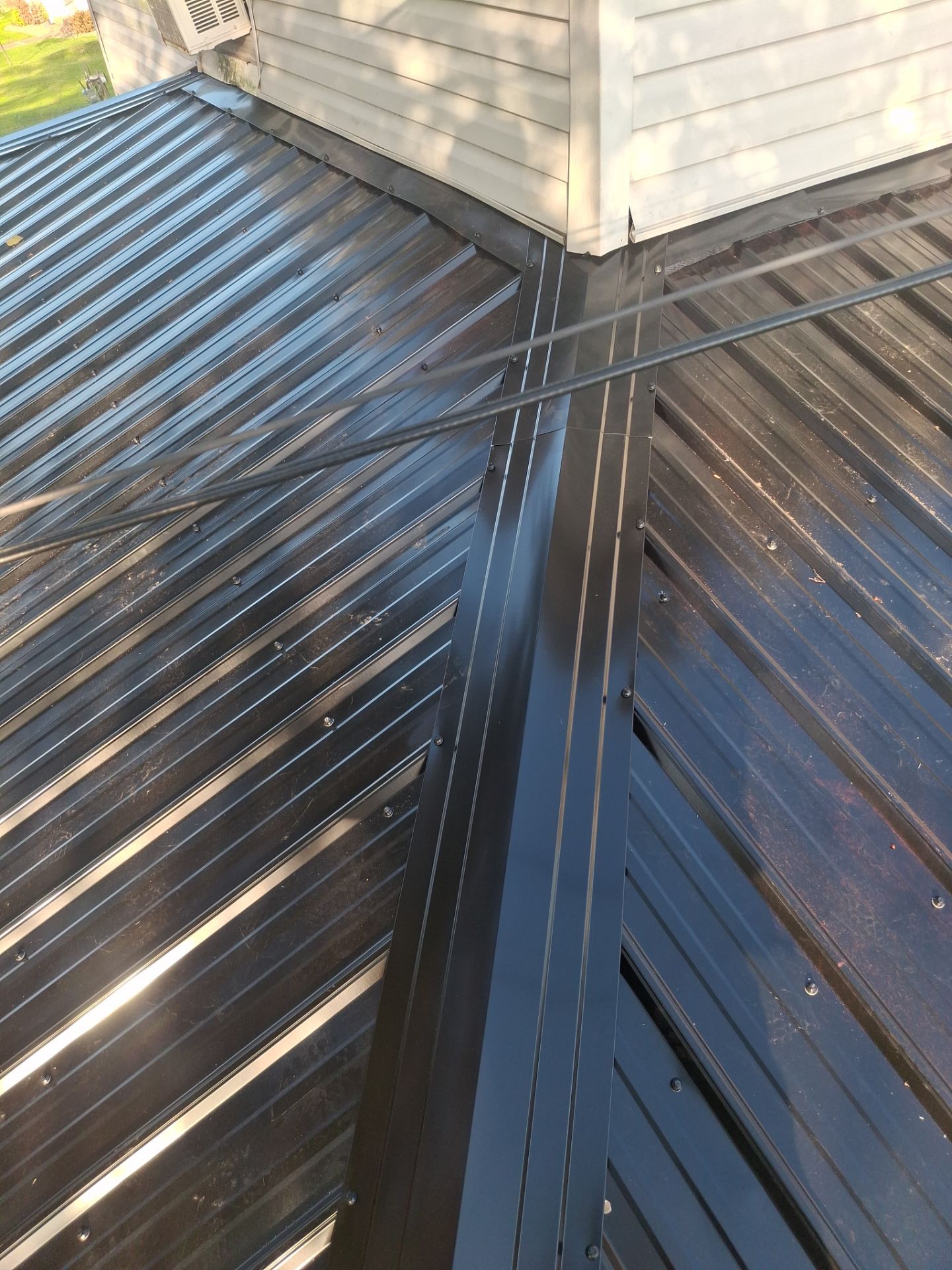 Residential Roofing Installation using Metal by Rainstoppers Roofing