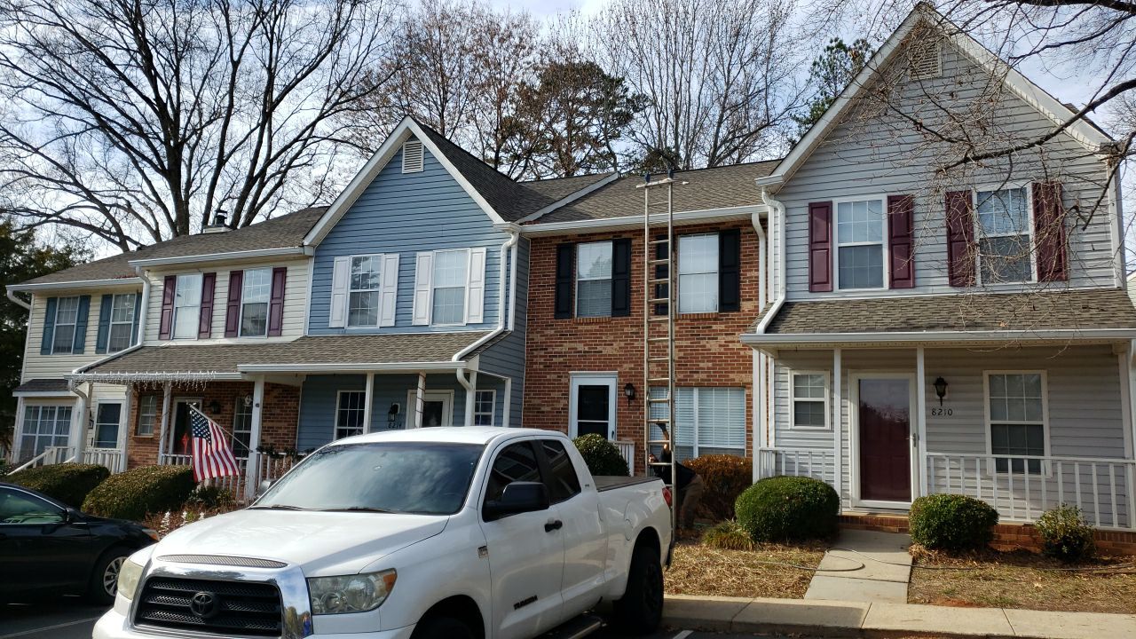 Gutter Cleaning using water by Power Wash Masters LLC