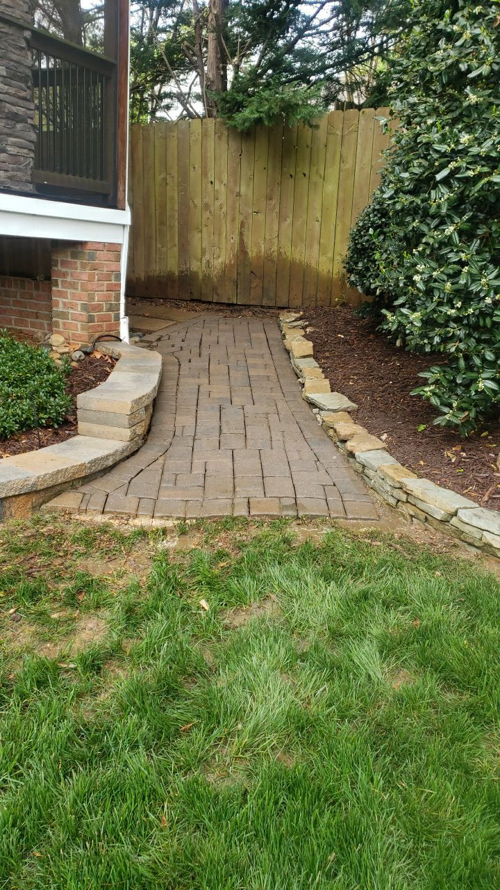 patio cleaning using cleaner by Power Wash Masters LLC