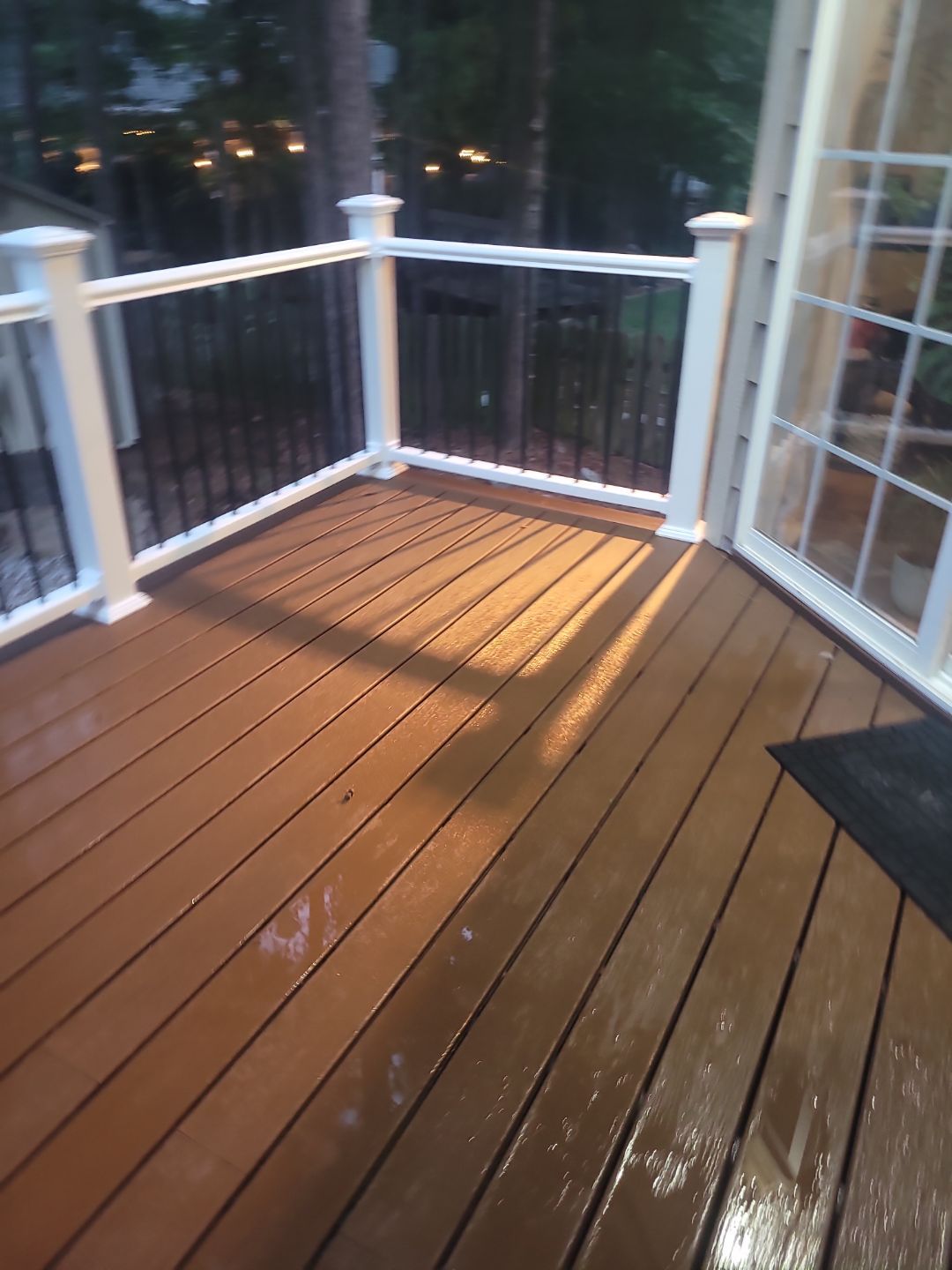 Fuquay-Varina Outdoor Upgrade – Composite Deck & Paved Landing by Elite Remodeling and Design LLC