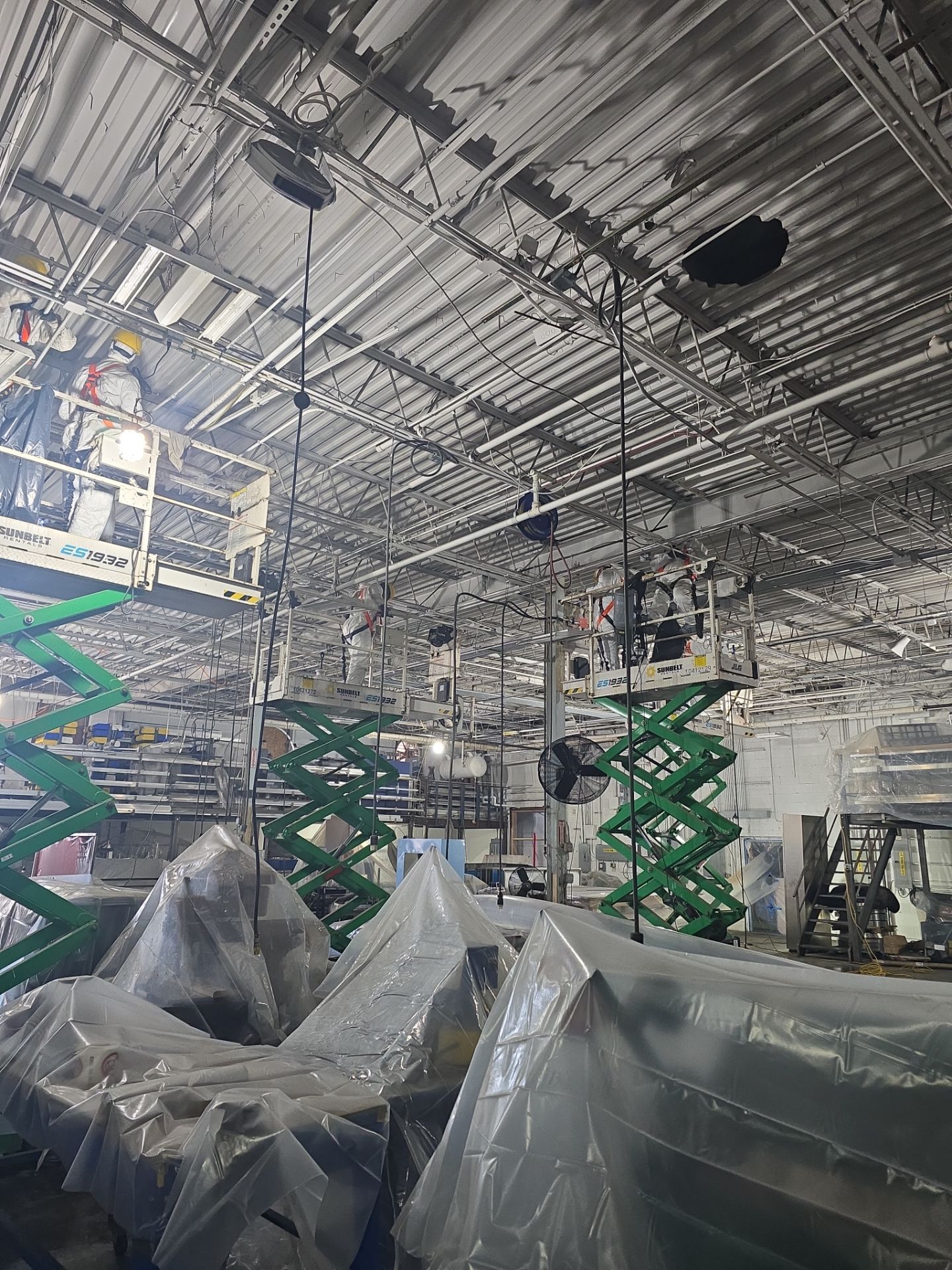 Industrial Warehouse Fire Damage Cleaning and Spray Sealing in Islandia by EMS Restoration Corp