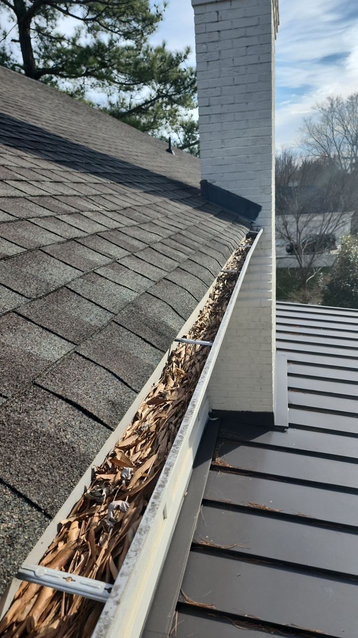 Gutter Cleaning using water by Power Wash Masters LLC