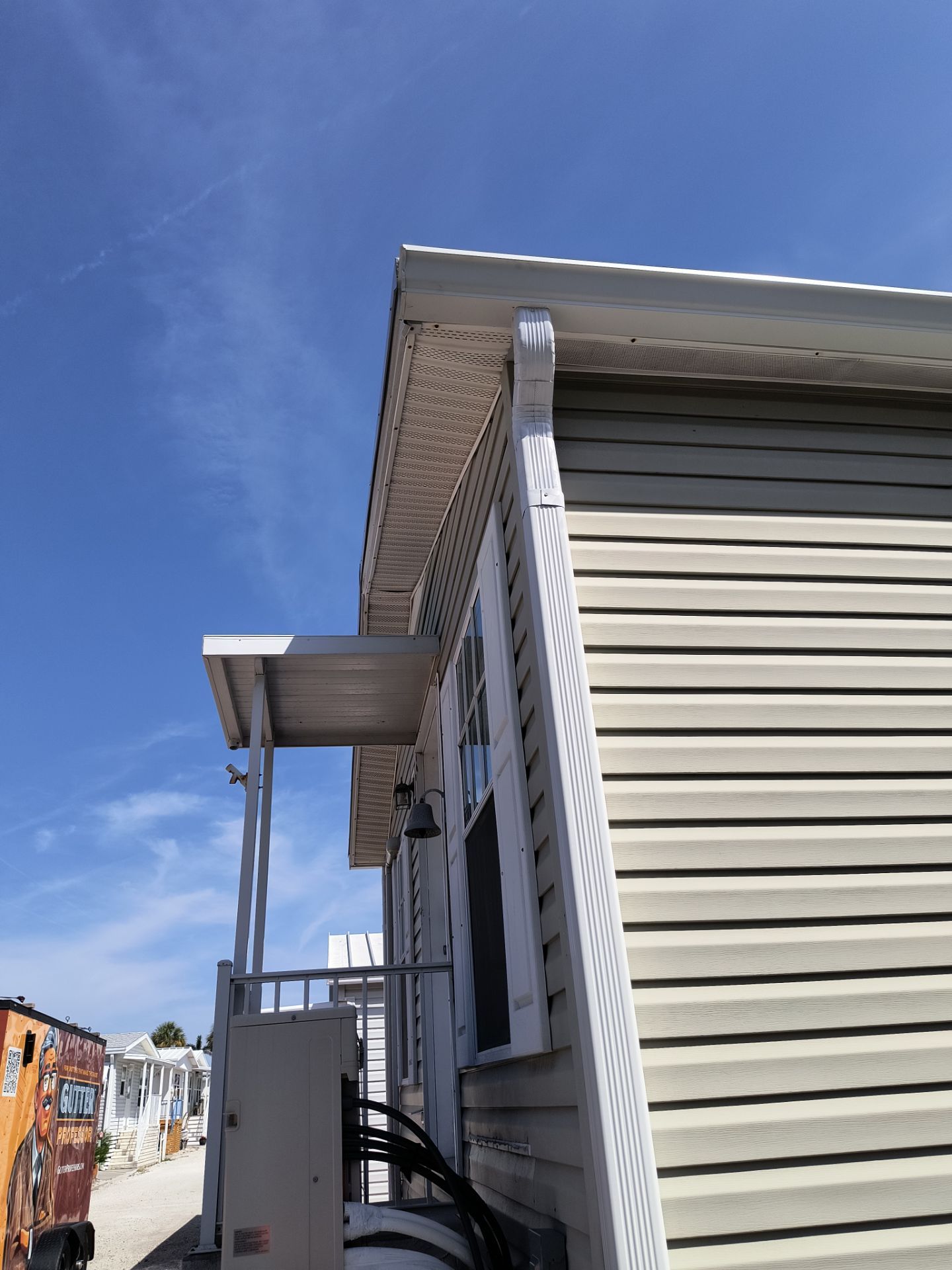 White K-Style Gutters for Beach Homes in Longboat Key FL by Gutter Professors