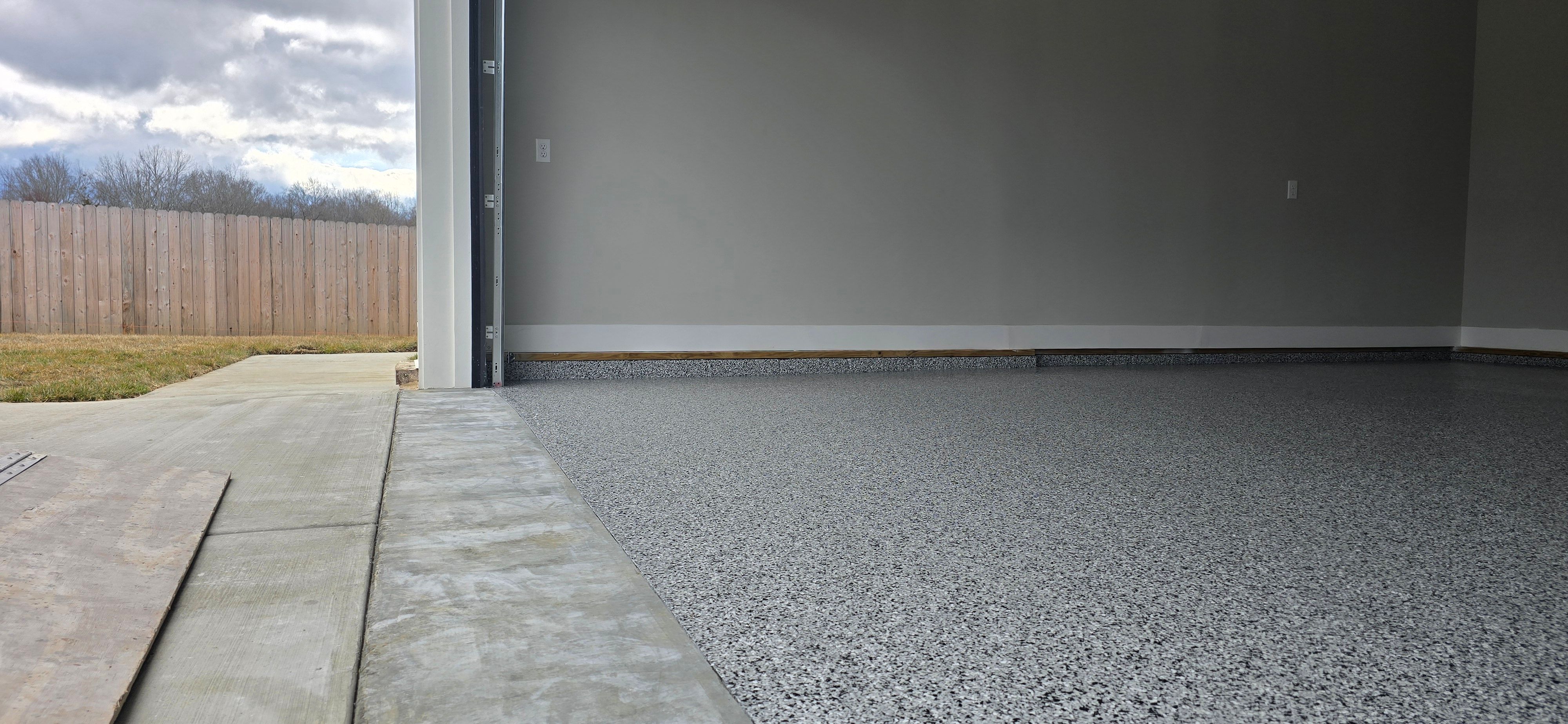 Garage using Houndstooth by Elite Floor Solutions