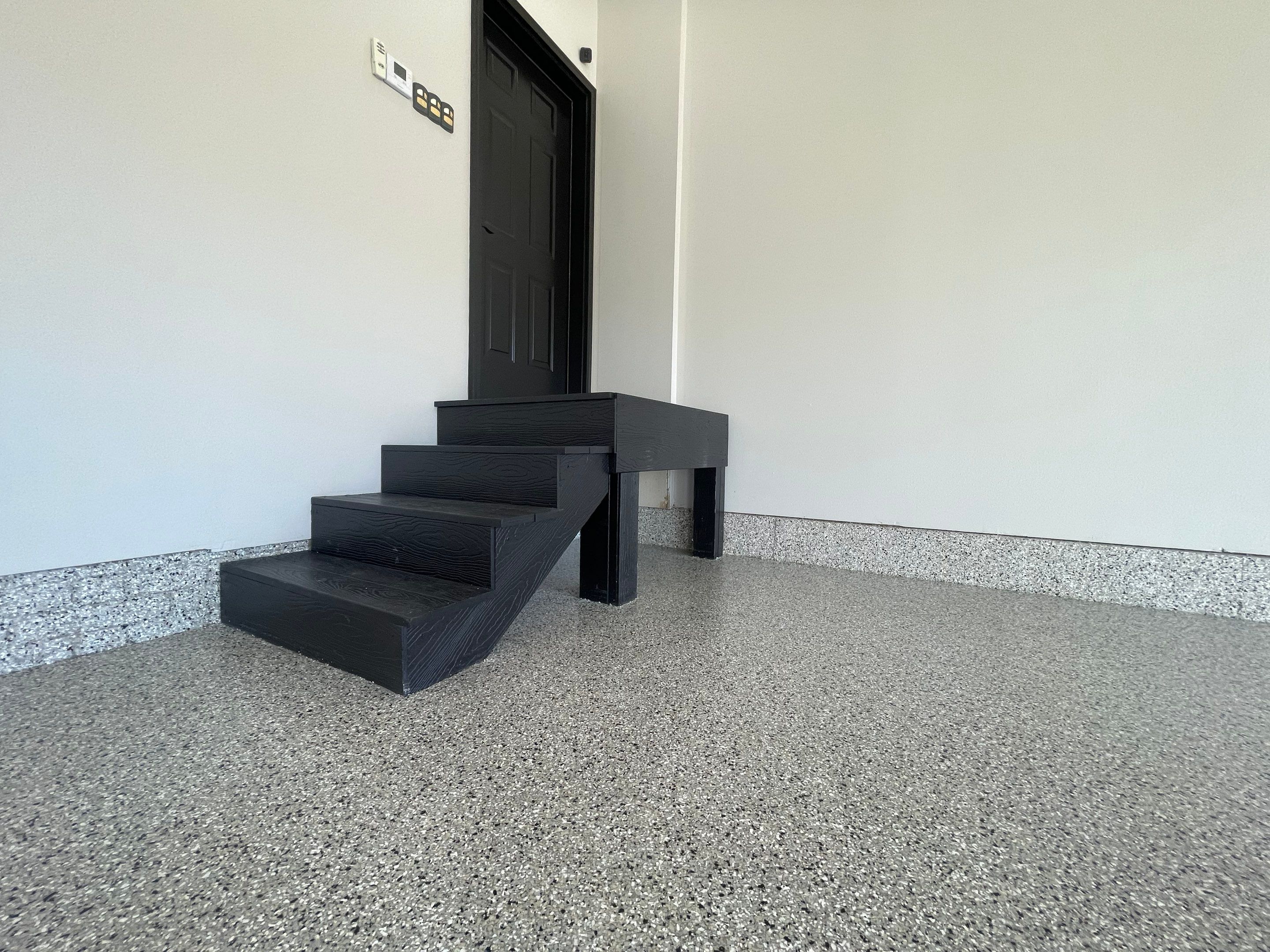 Multi-Car Garage Epoxy Floor Coating in Beresford by Select Painting, Coatings & Garage Cabinets