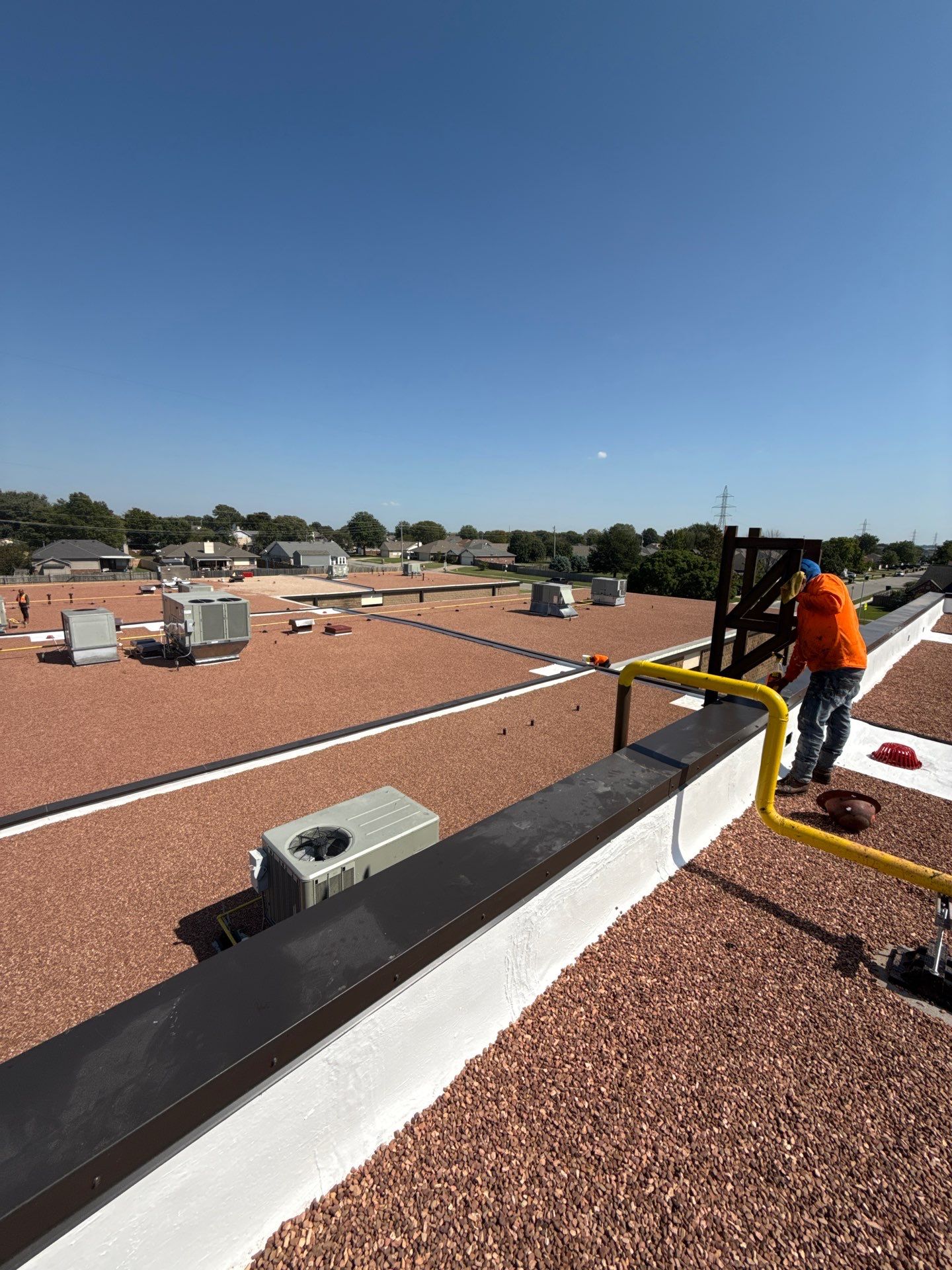 Mills Elementary School Commercial Re-Roof and Moisture Protection by Secondary Rhodes