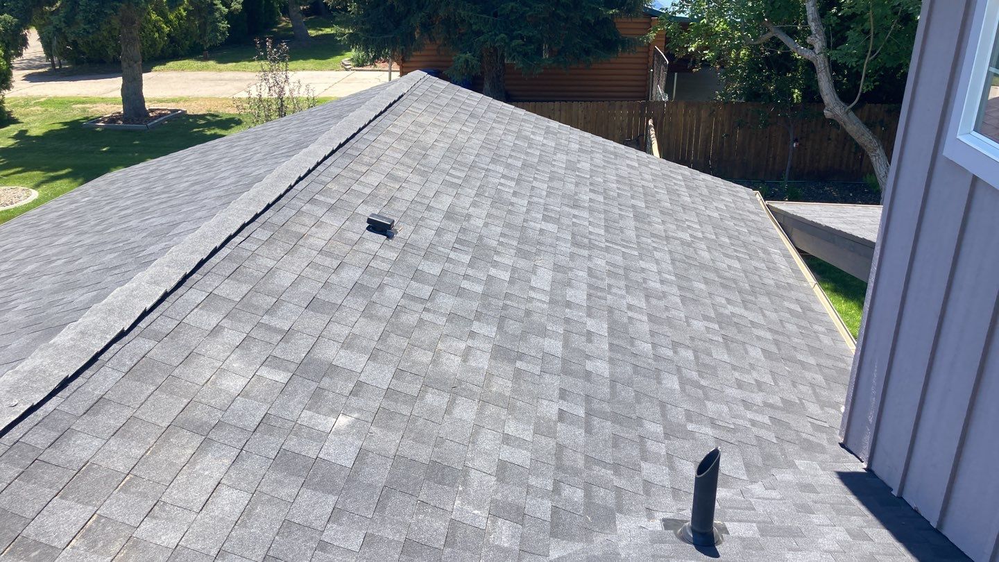 Breaking News!  Happy Homeowner gets a fantastic new roof by ID Roofing LLC