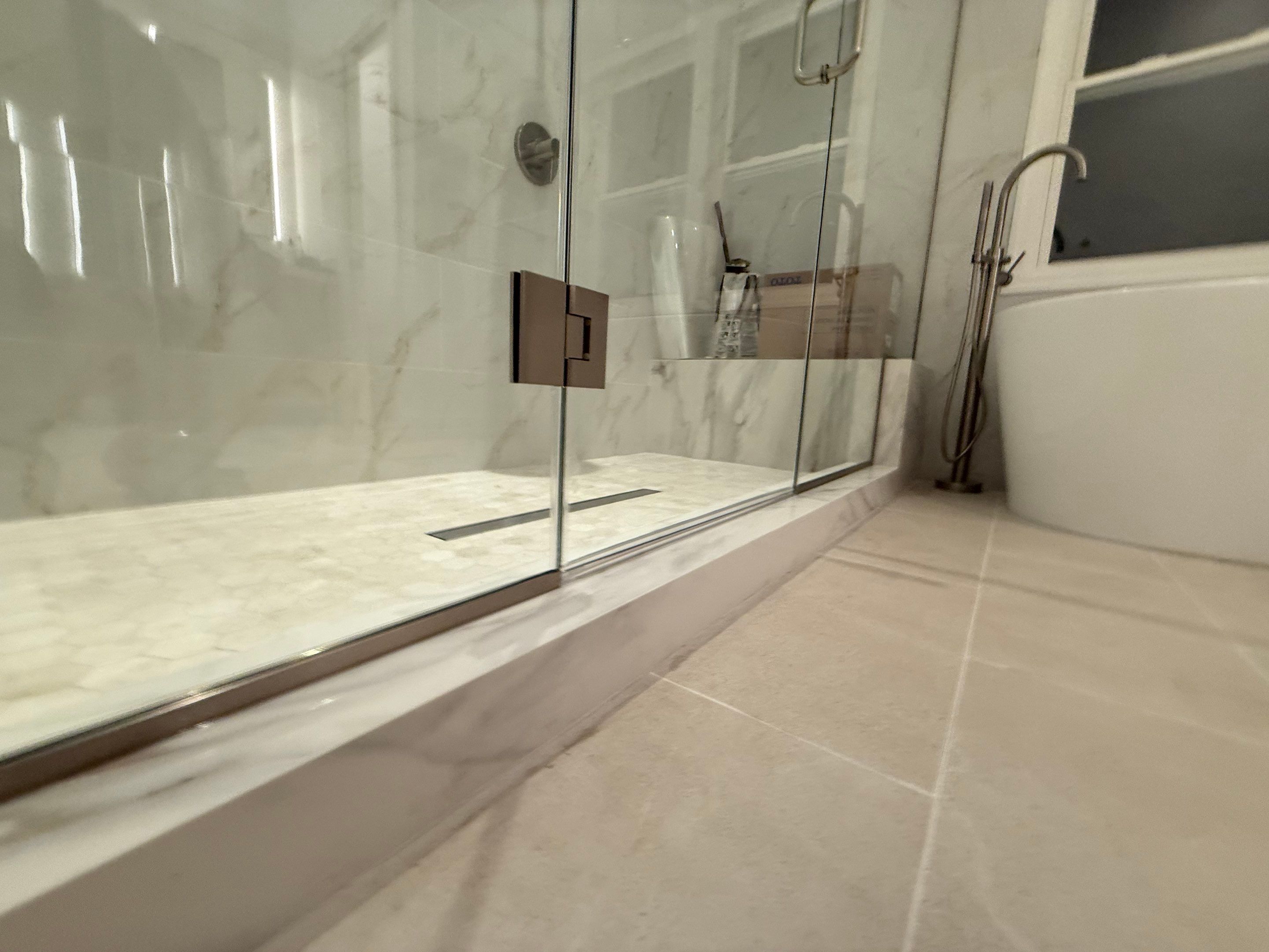 Bathroom Remodel using Tile by Home Concepts Construction