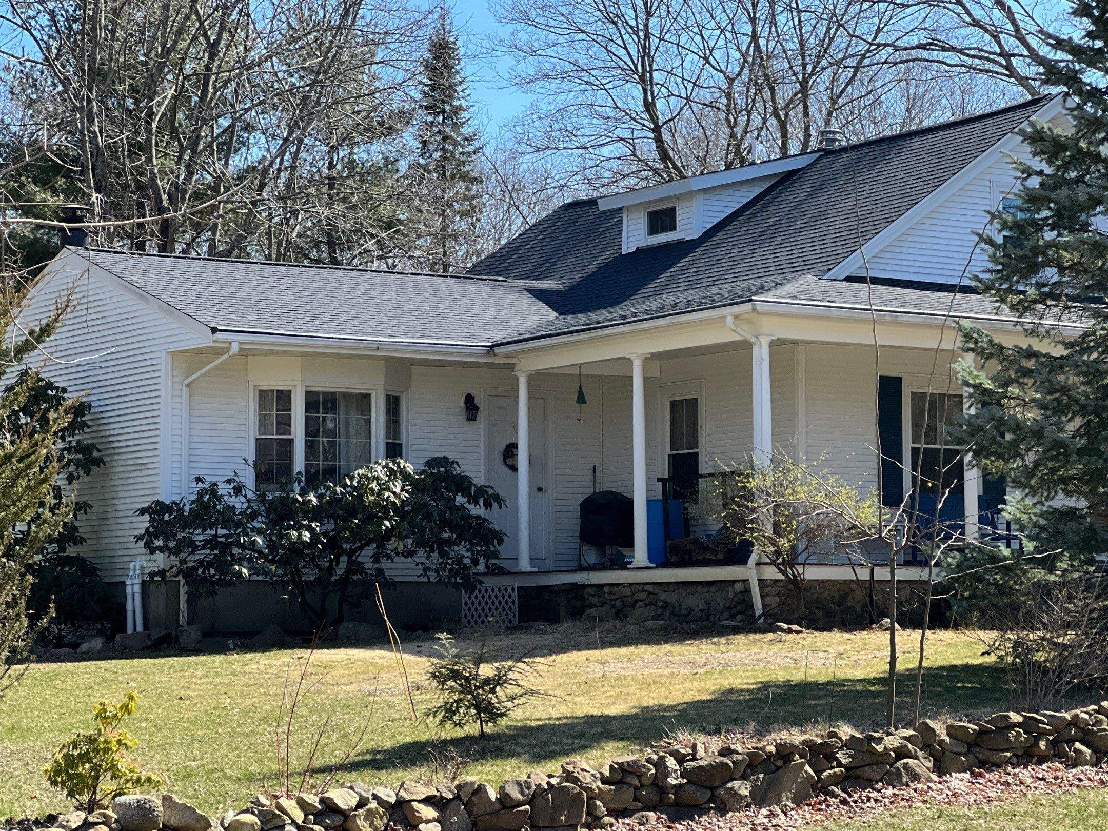 Charcoal Black Roofs by Pinnacle Roofing & Skylights