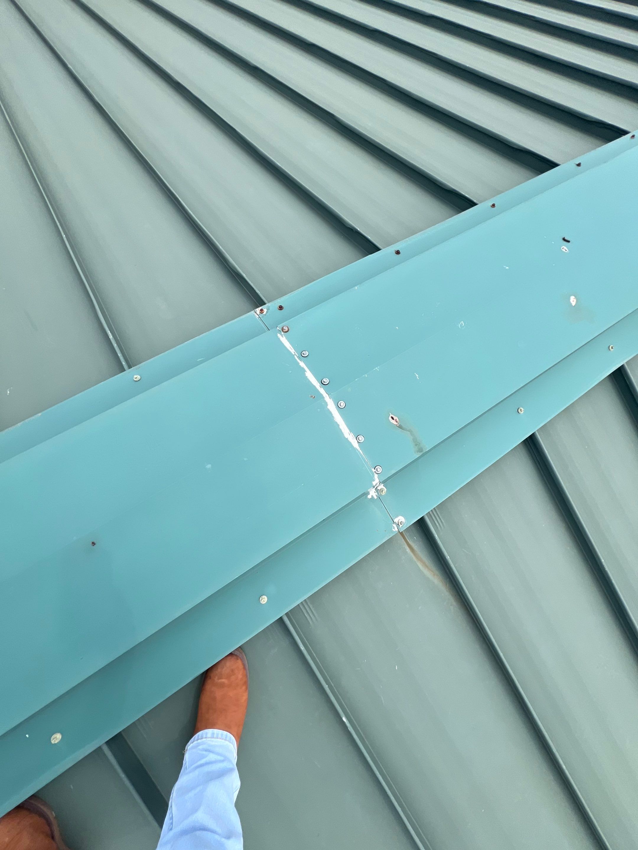 Hail Damage using Metal by Roof Repair Company