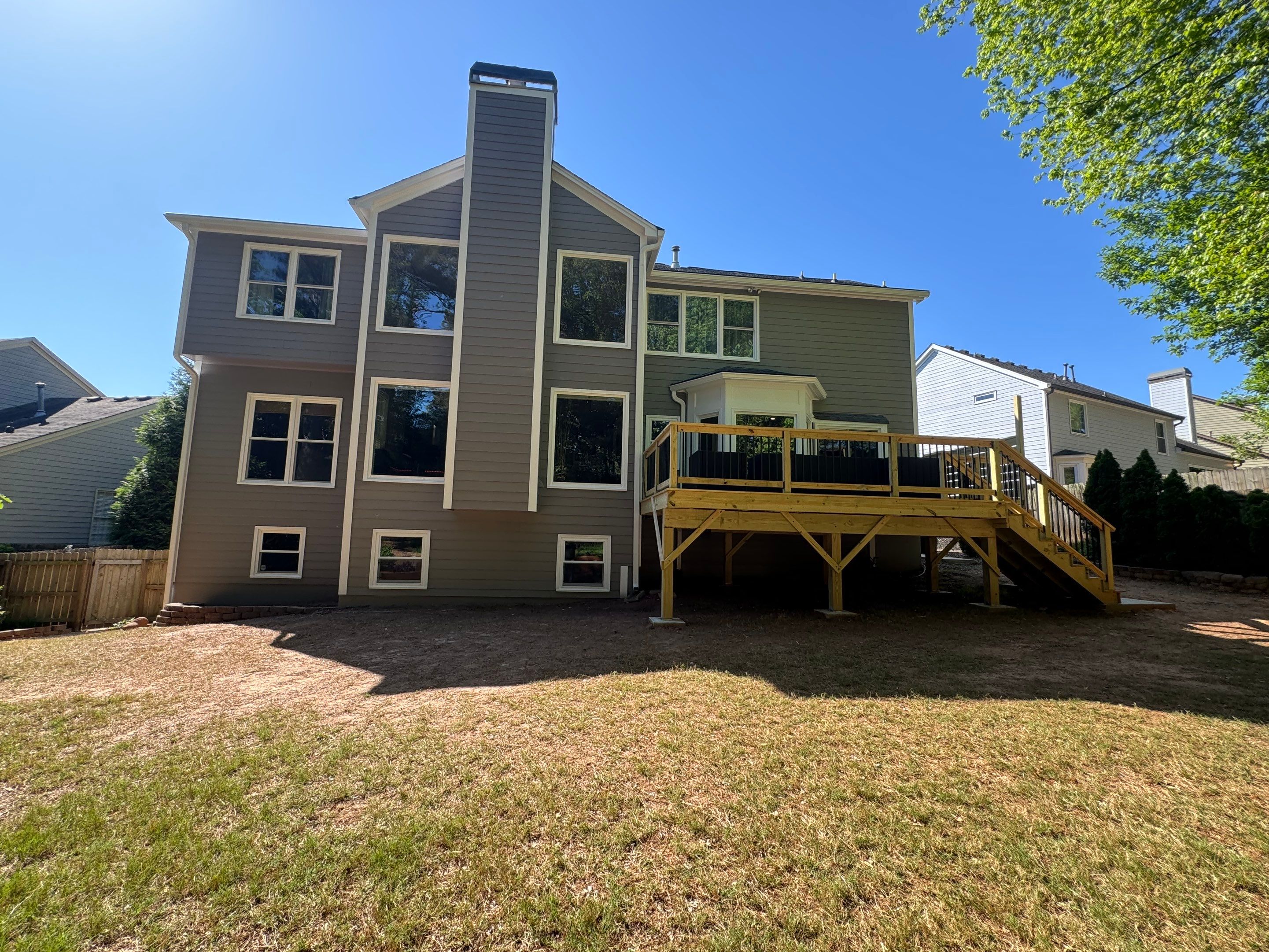 Full Exterior Siding Replacement and Custom Deck in Johns Creek by Swift Home Renovations 