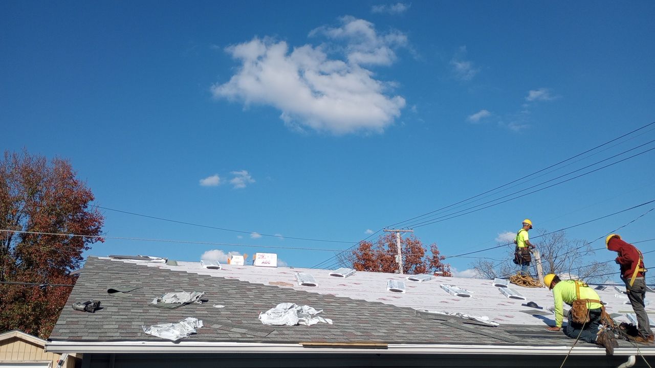 Commercial Roofing Installation using Performance Shingles by Mr. Roofer