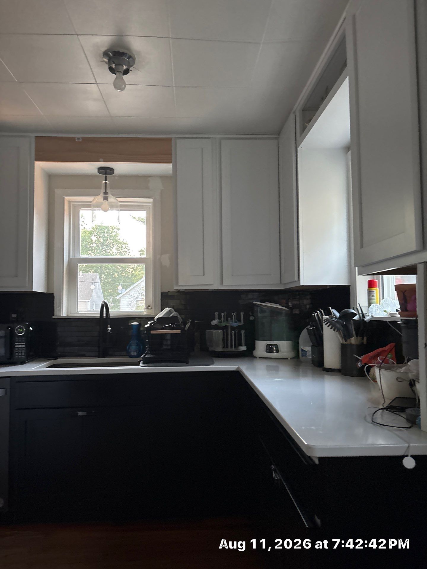 Two-Tone Kitchen Remodel with Black Subway Tile in Lincoln by CompanyCam Sales Demo