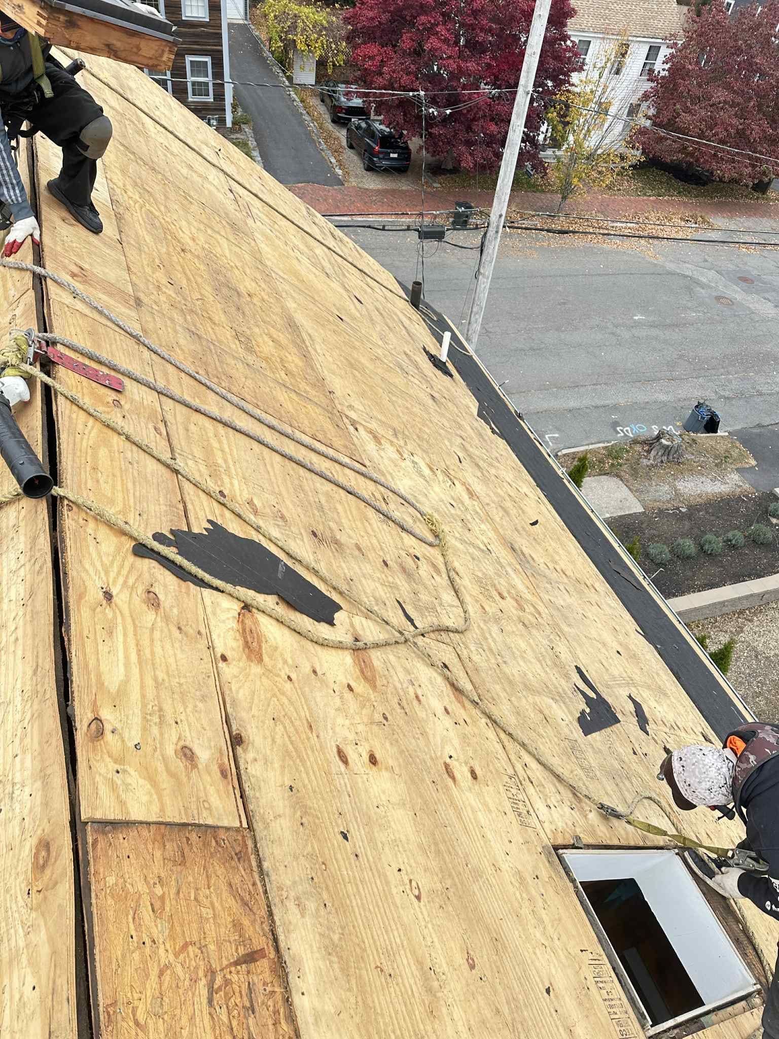 Newburyport Complete Roof Replacement with Solar Venting Skylight by Mighty Dog Roofing of Greater Middlesex County