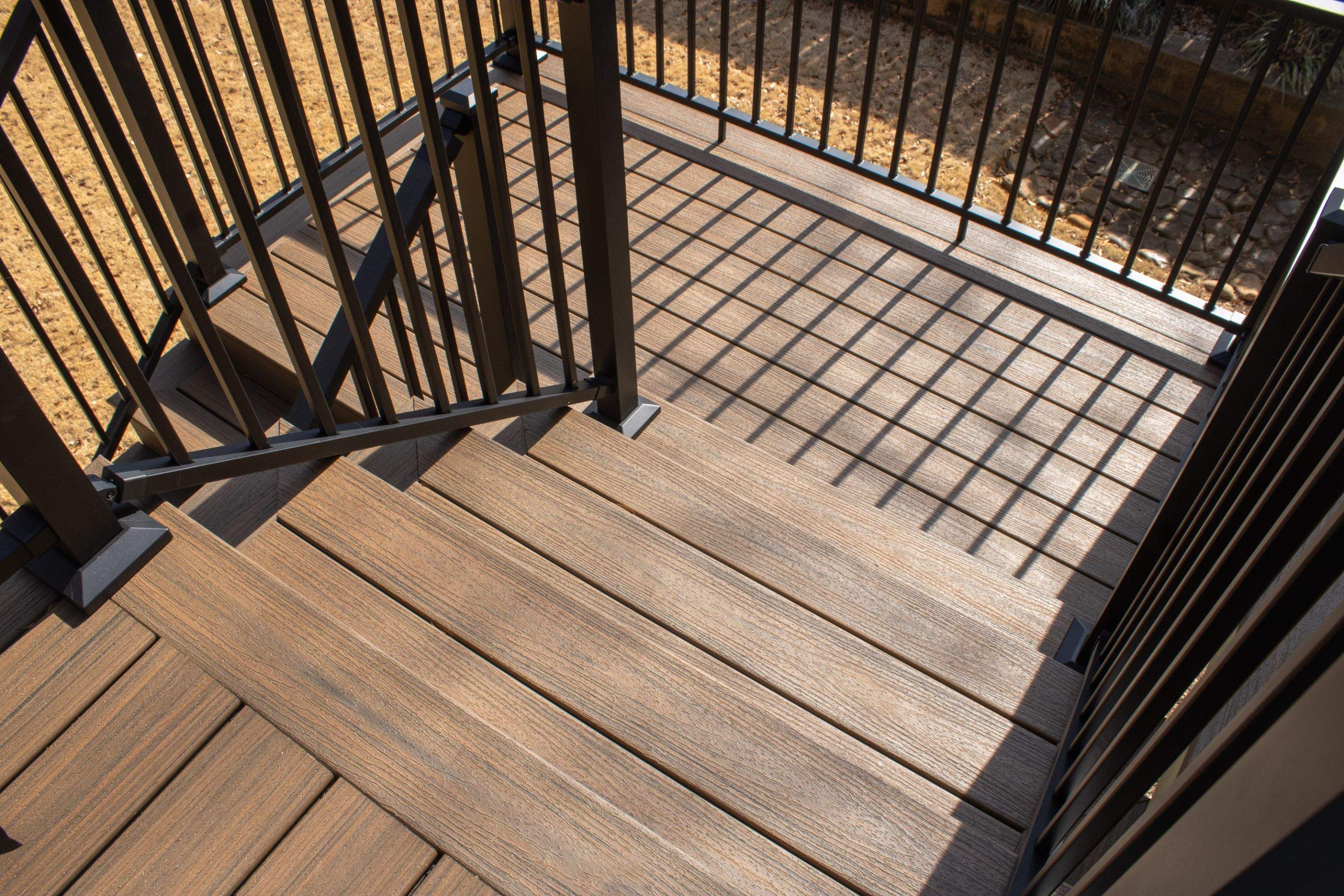 Deck Resurface using Trex and Deckorators ALX Contemporary railing by Nelson Exteriors 