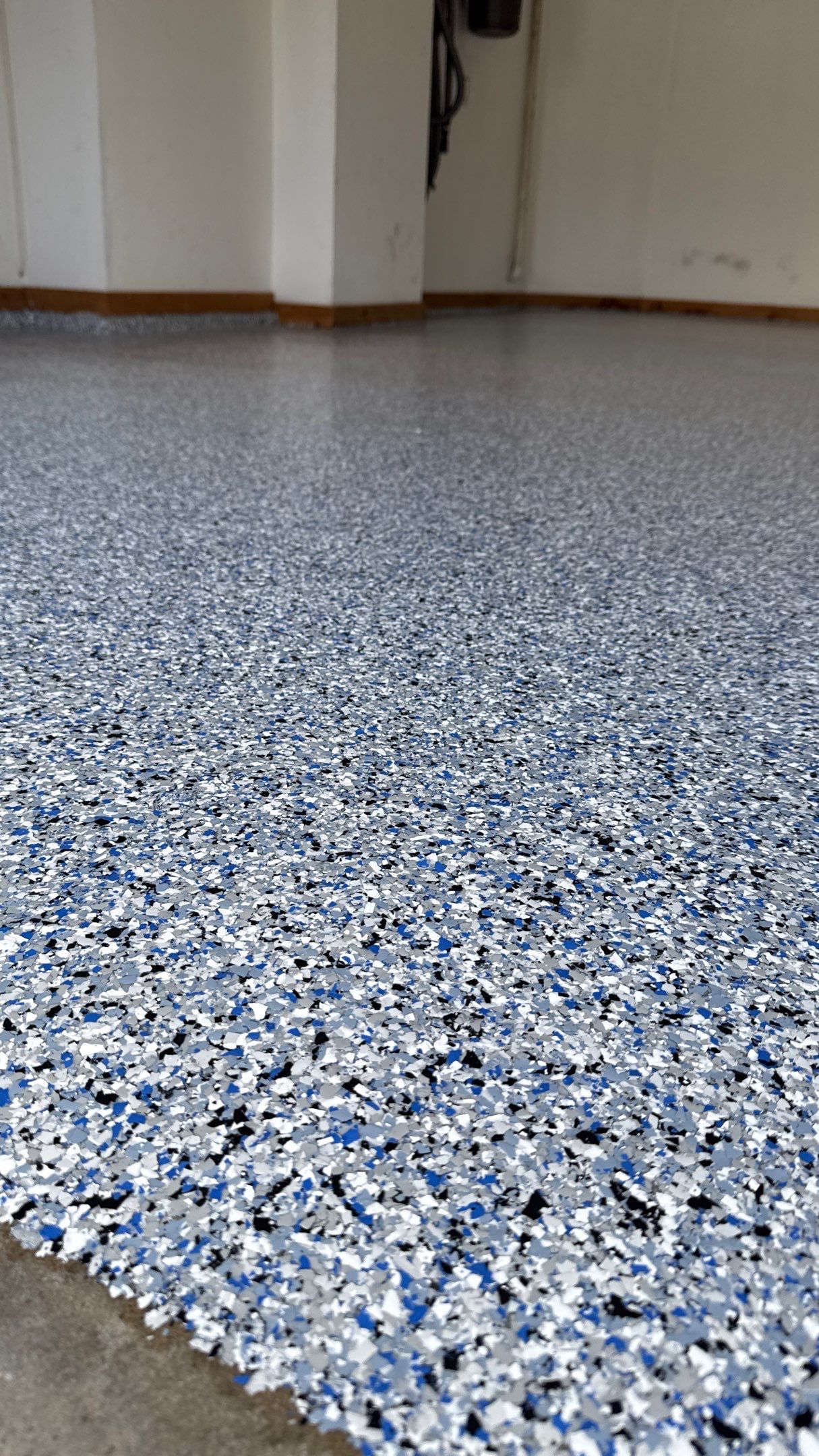 Custom "Comet" Epoxy Garage Floor Renovation in Lawrence by Banner Garage