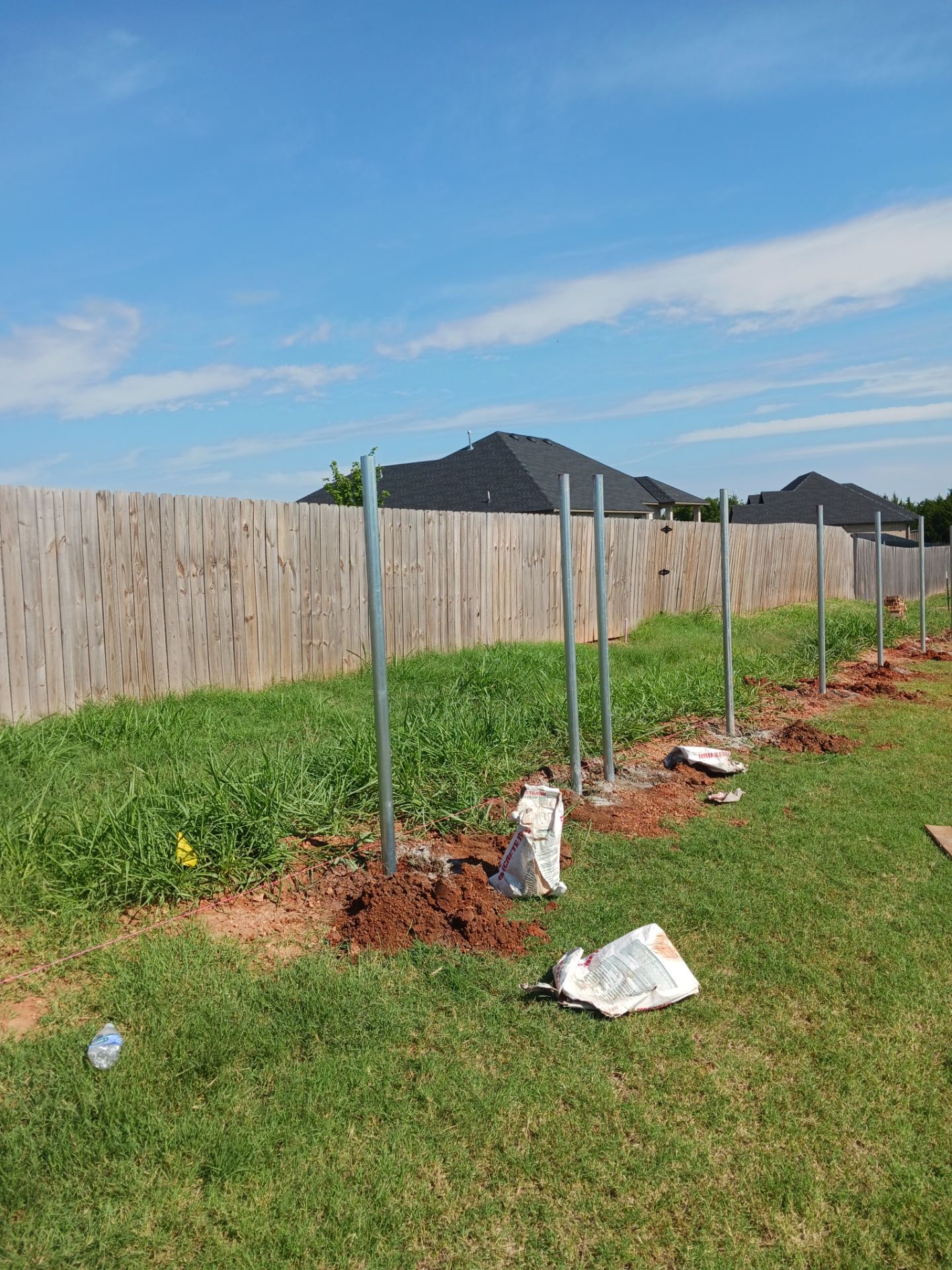 Cedar Fence using Metal Poles by Clays Services Inc