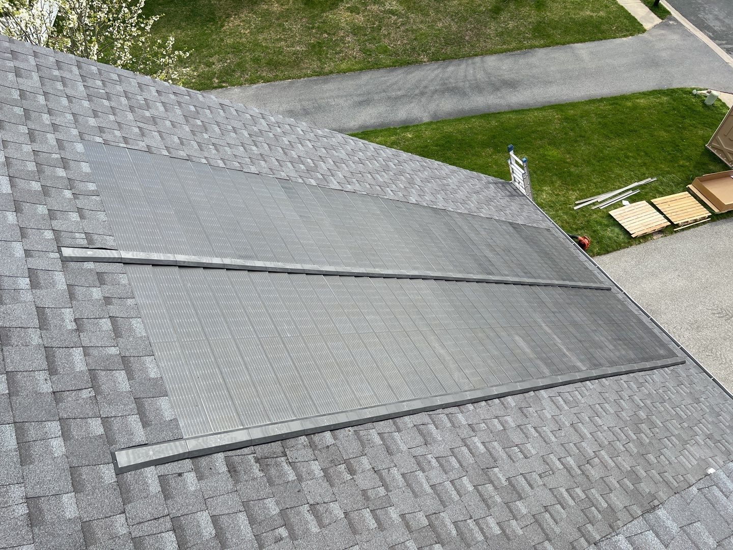 Solar Roof Replacement using GAF Timberline Solar Shingles by American Home Contractors