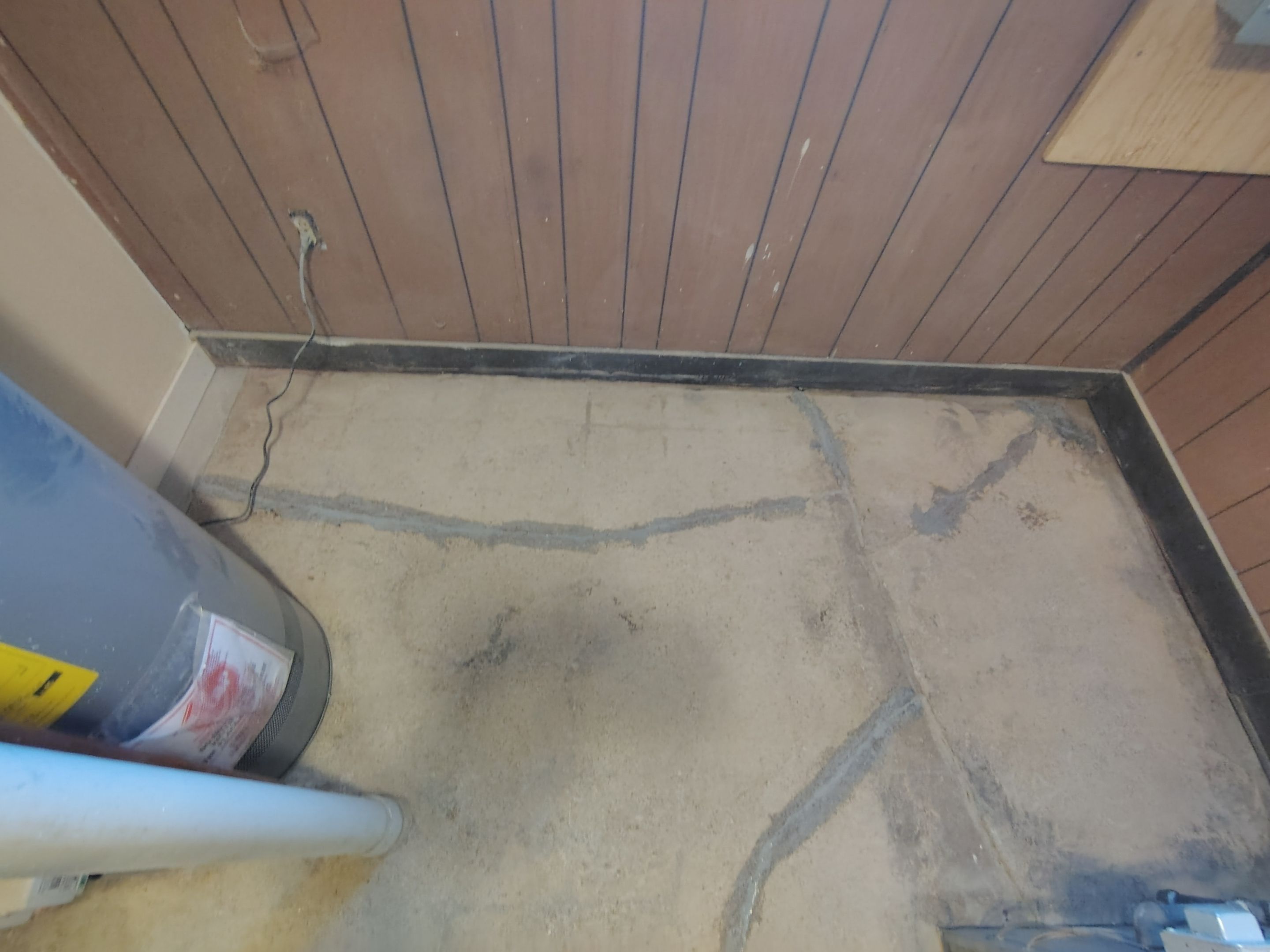 Comprehensive Basement Concrete Floor Coating and Crack Repair in Sioux Falls by Select Painting, Coatings & Garage Cabinets