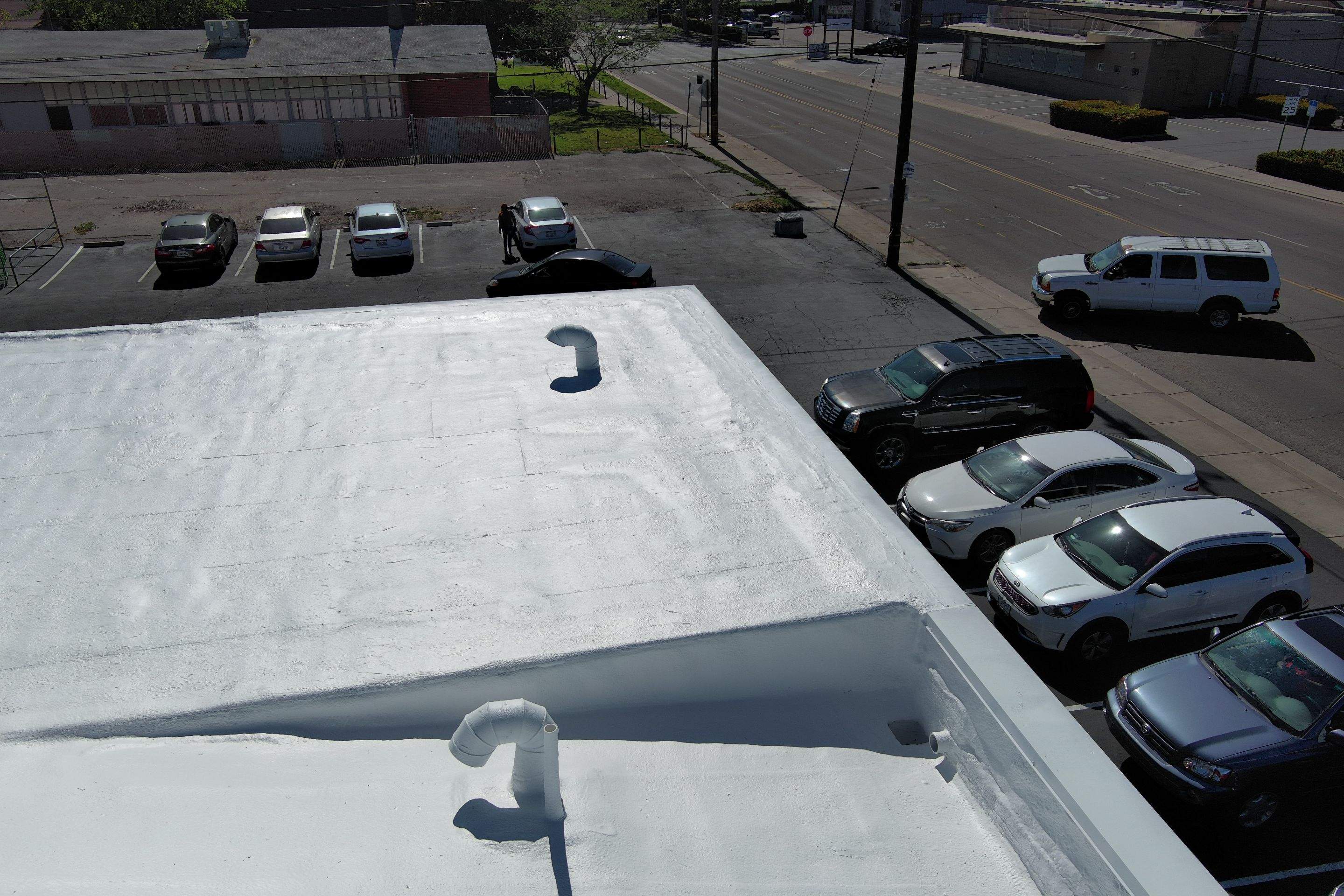 Foam Refurbish using Conklin Benchmark/PUMA XL coatings and spray foam by Straight Edge Roofing Inc