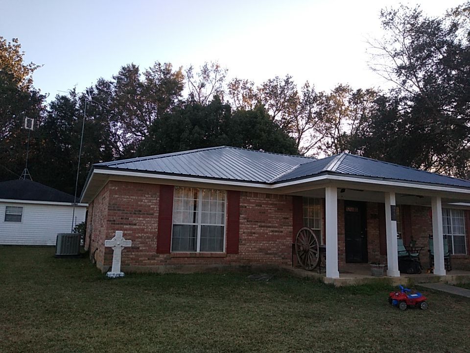 Residential Roofing Installation using Roof Replacement by American Roofing & Construction LLC