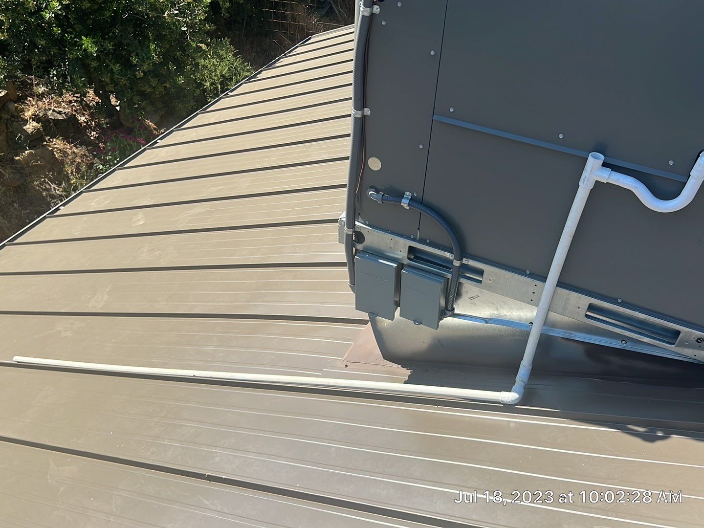 Metal roofing installation using ASC Standing Seam metal by Straight Edge Roofing Inc