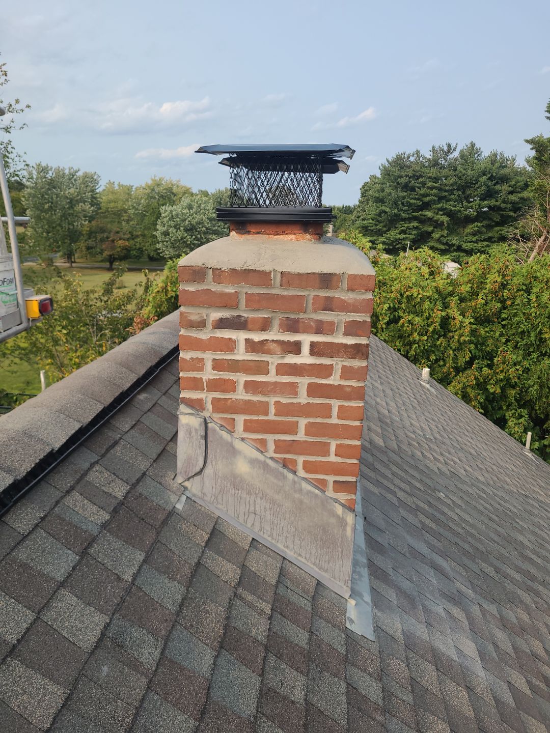 Complete Chimney Restoration and Gutter Guard Installation in Littlestown, PA by Bealing Roofing & Exteriors