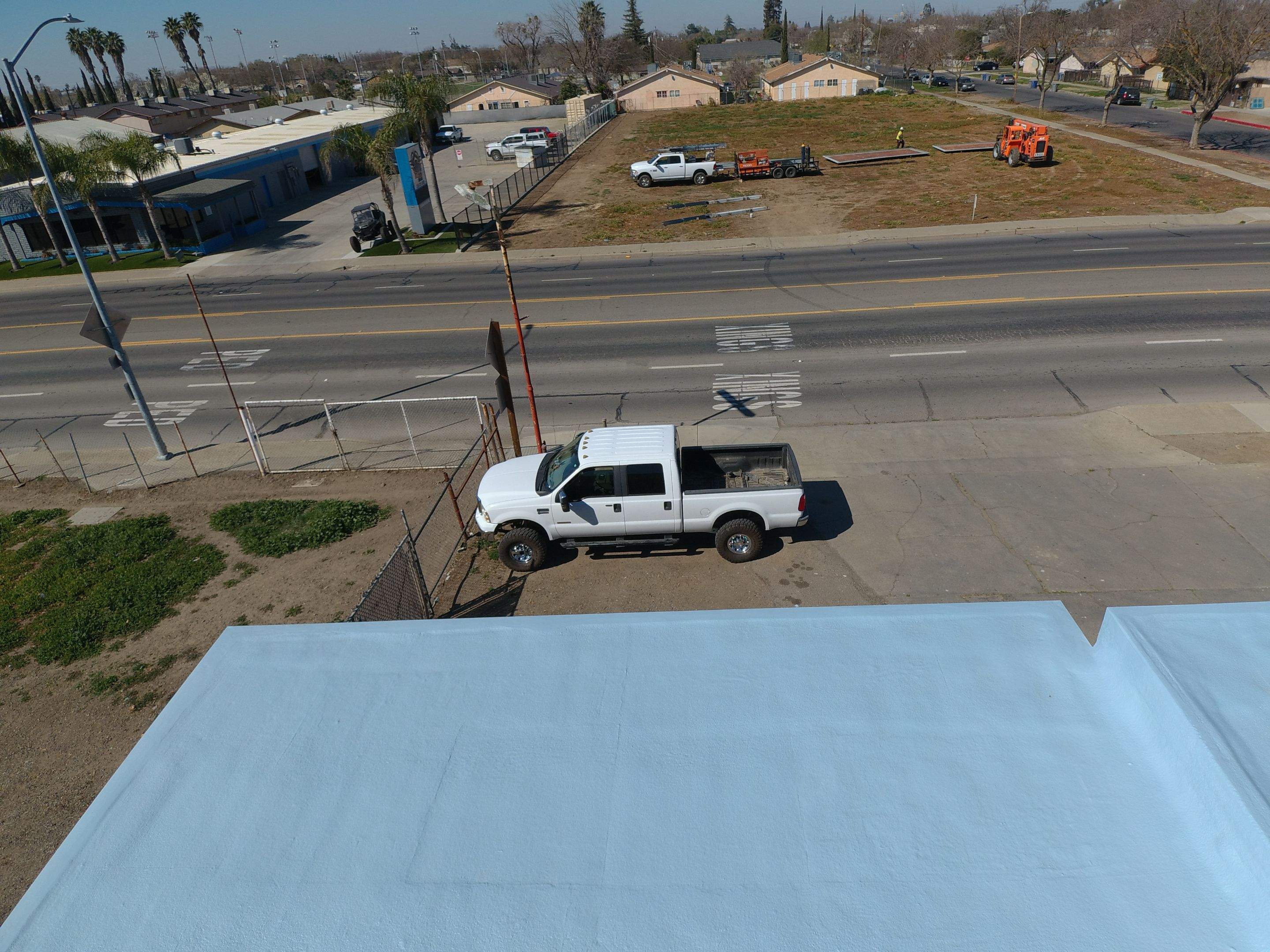 Spray foam and coatings using Conklin Benchmark/PUMA XL coatings and spray foam by Straight Edge Roofing Inc