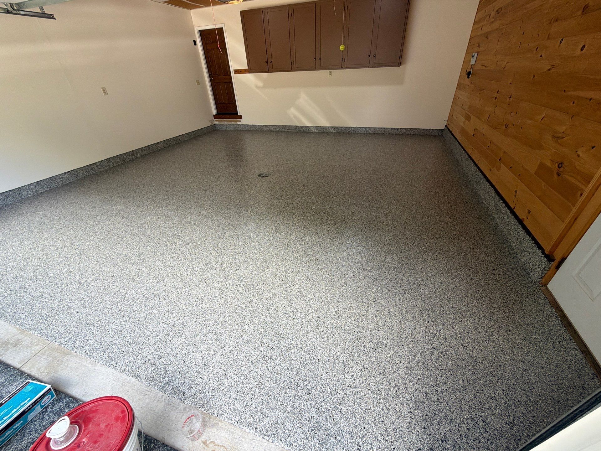 Gray Speckled Epoxy Flake Floor Coating in Muskegon by Gordon Painting