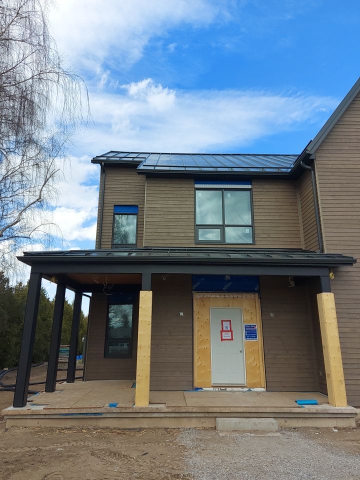 New Home Construction using 16" Standing Seam Panels by Jay Carter Roofing & Sheet Metal