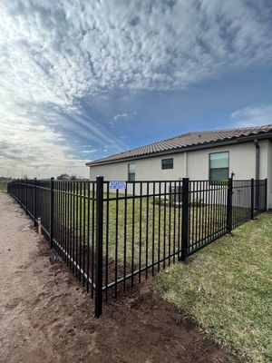 Aluminum Fence Installation using Black 3 Rail Aluminum Fence