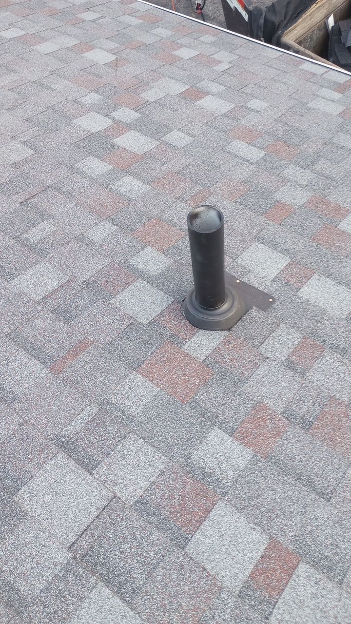 Commercial Roofing Installation using Performance Shingles by Mr. Roofer