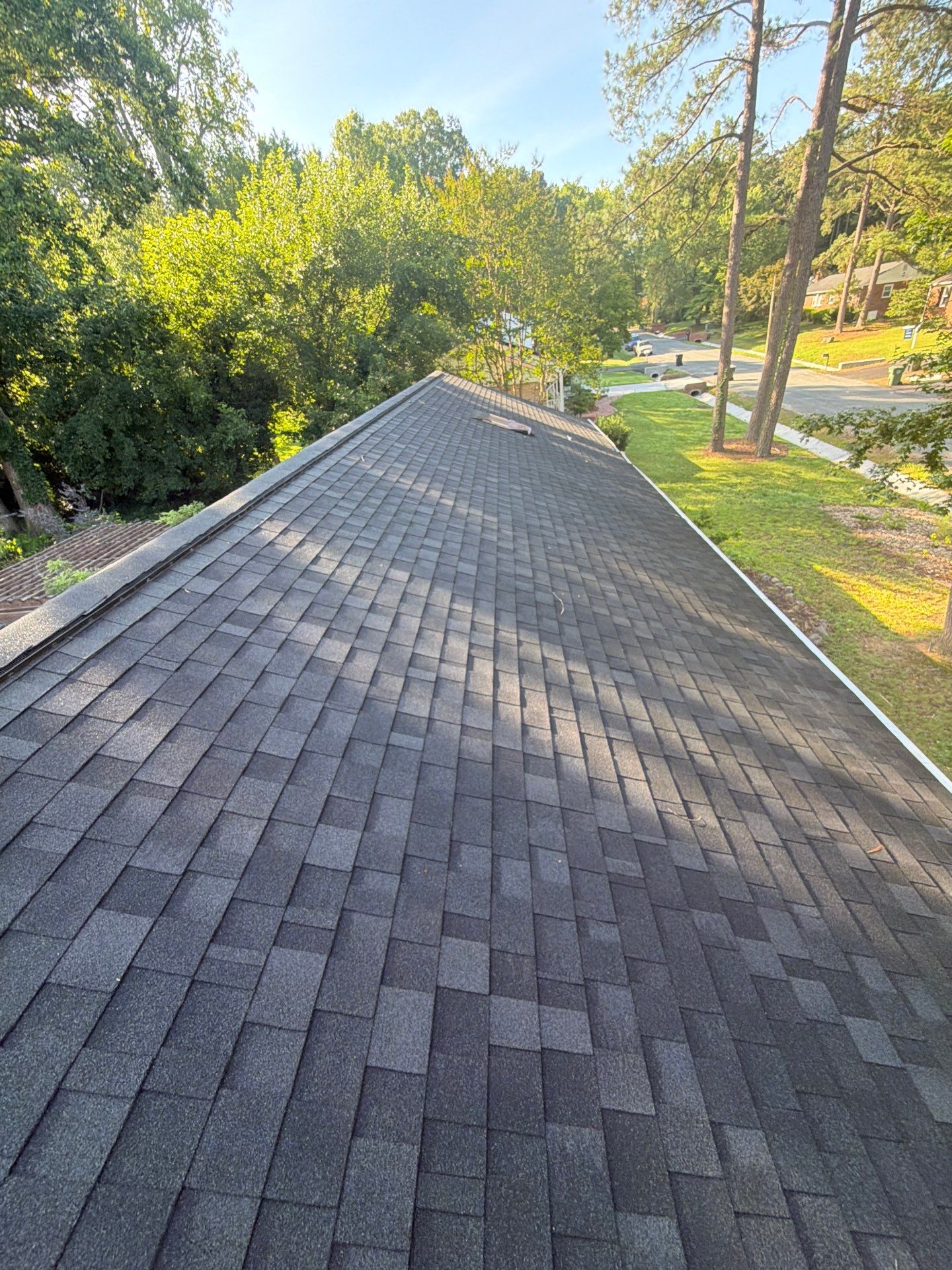 Asphalt Shingle Roof Replacement and Gutter Installation in Richmond by Cade Construction