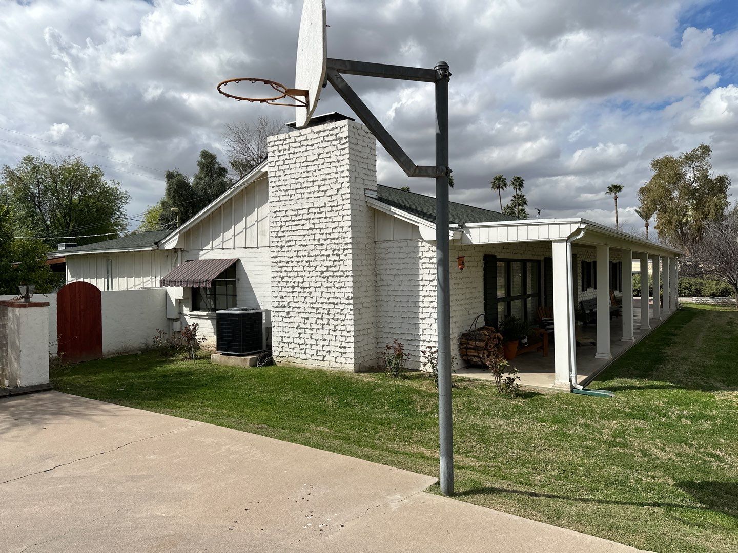 Wagon Wheel - A Stunning Home Exterior Makeover with Dunn Edwards Paints in Phoenix, AZ by Double G Painting Contractors, LLC
