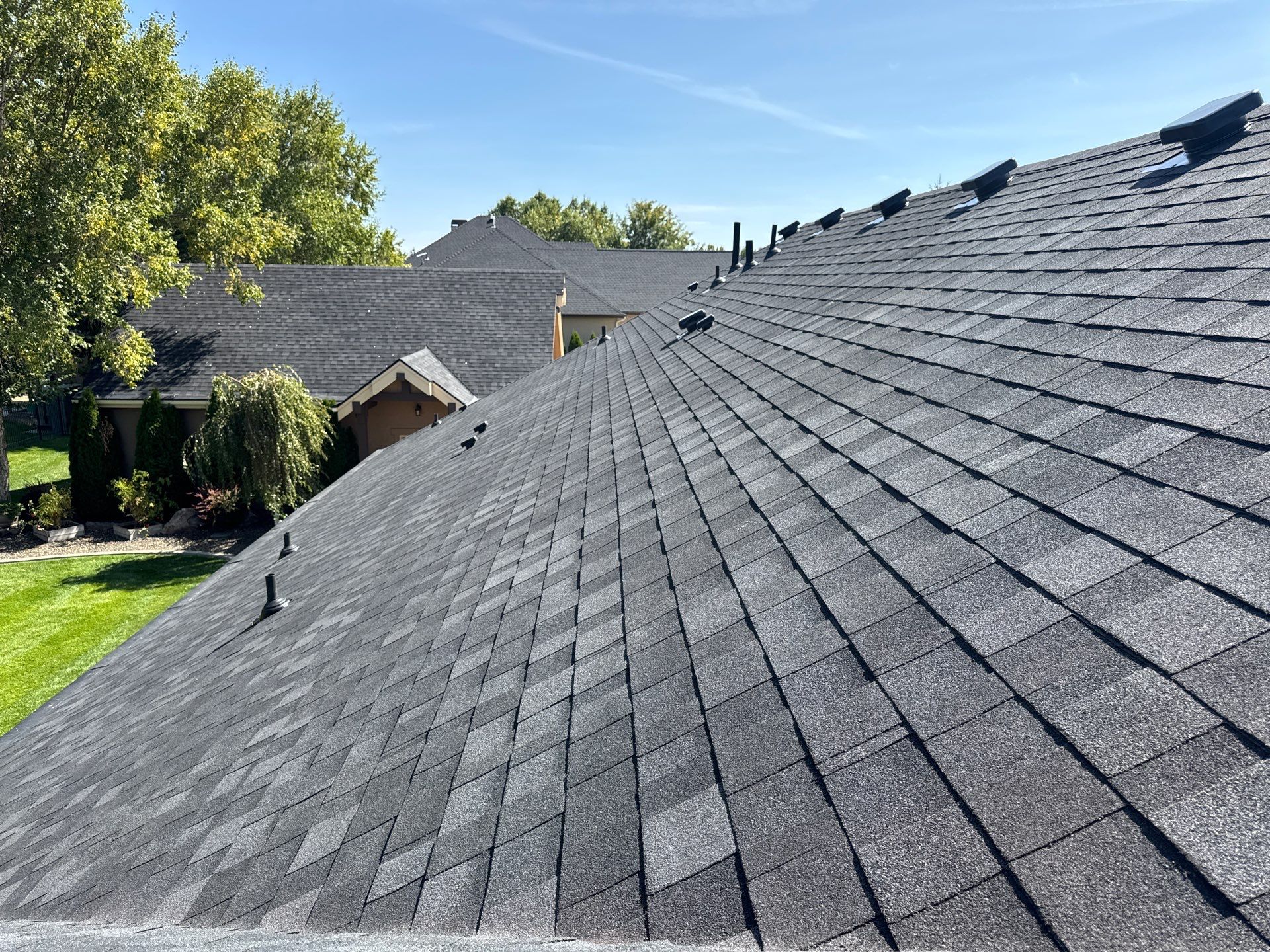 Middleton Residential Roof Replacement with Dark Grey Architectural Shingles by Olive Roofing