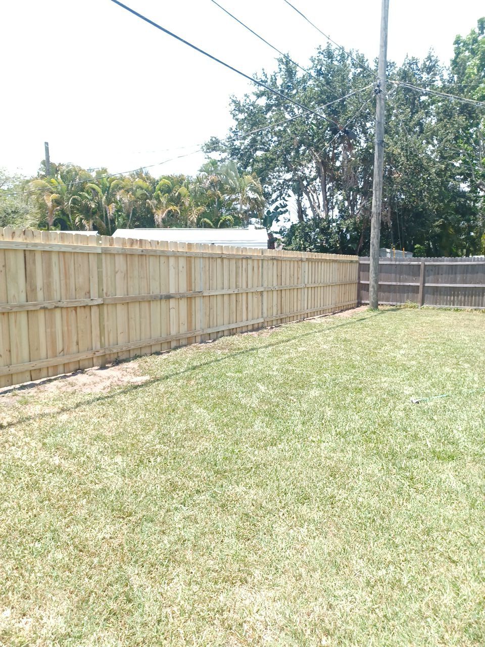 Bradenton, FL 6ft. Treated Board on Board Privacy Fence by Asap fence and gates, LLC
