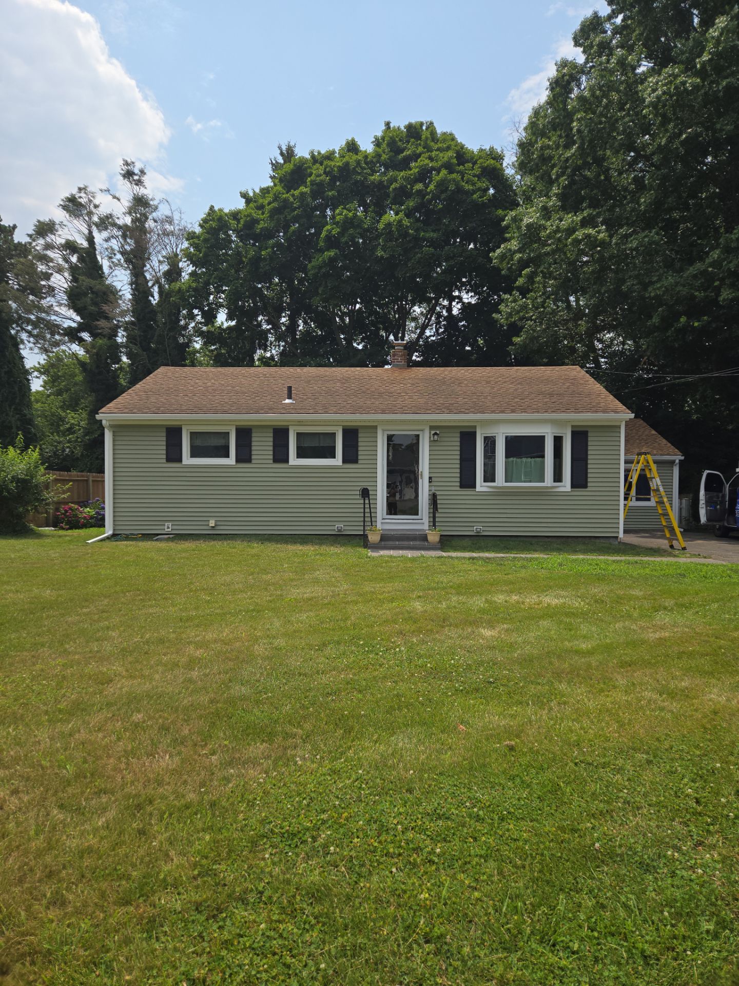 Siding Installation using Clapboard Monogram D4 Cypress by A Plus Exterior