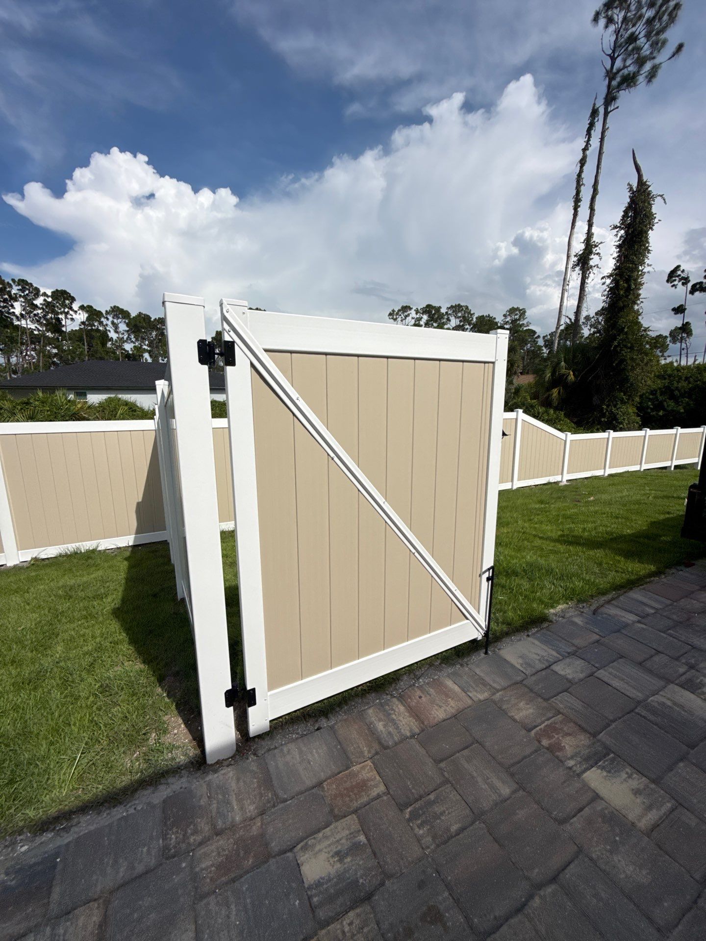 Custom Two-Tone Vinyl Privacy Fence Installation in North Port by True Fence LLC