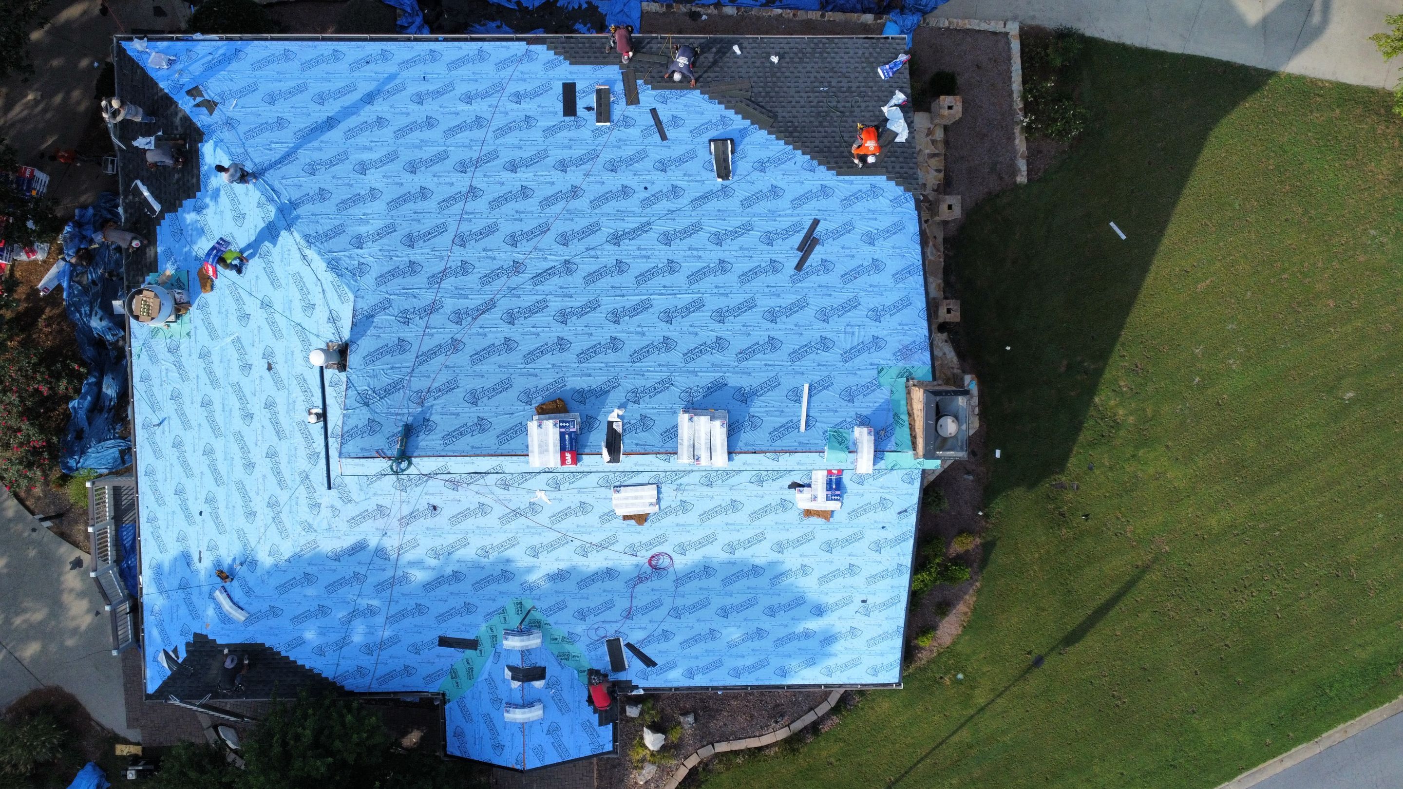 Country Club Roofing Installation by Reset Roofing