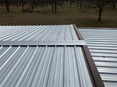 Install new R Panel Metal Roof at a Clients Farm house
