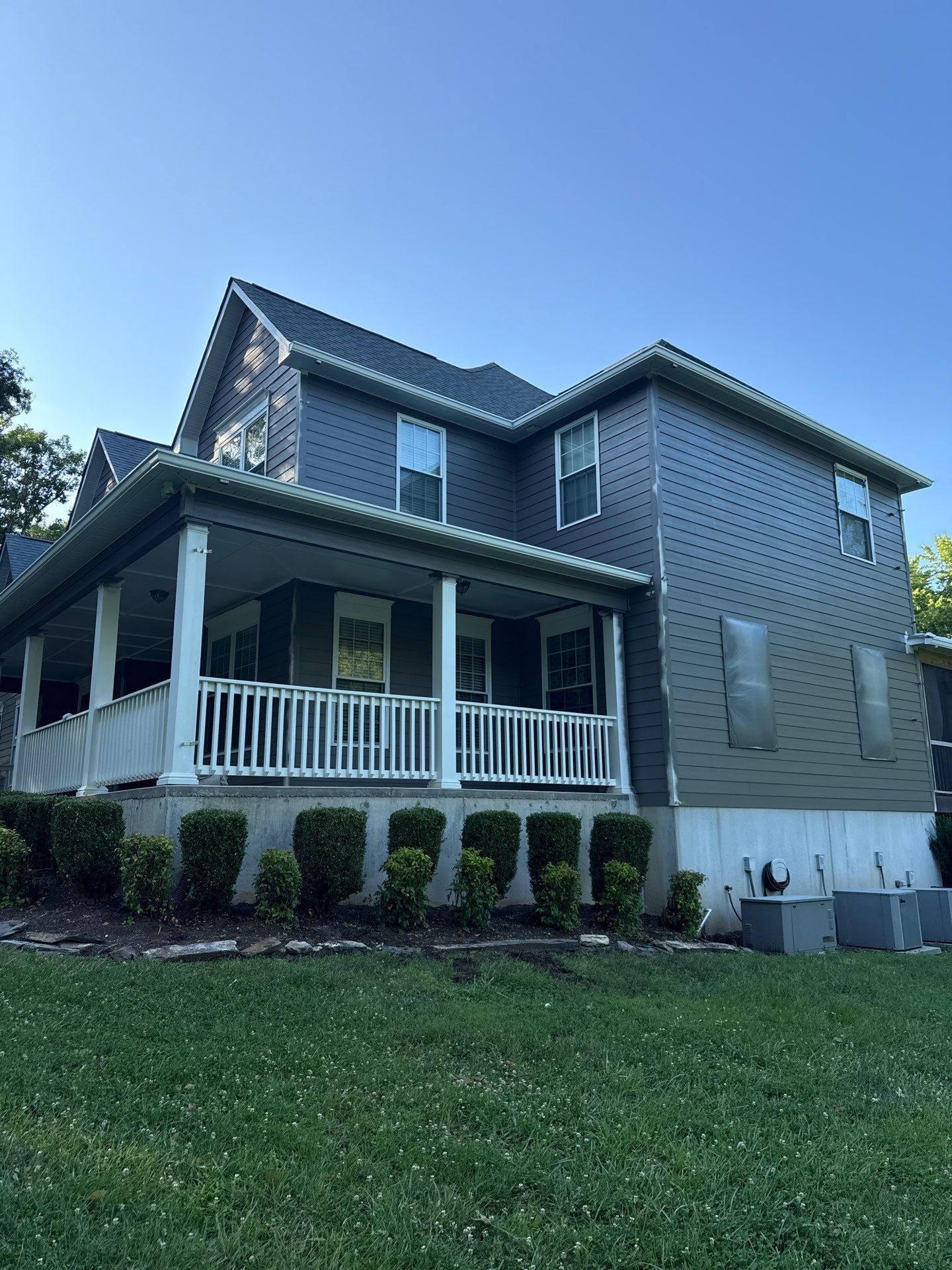 Siding replacement, exterior painting, and front door staining. by GonzalezPainters & Contractors Inc
