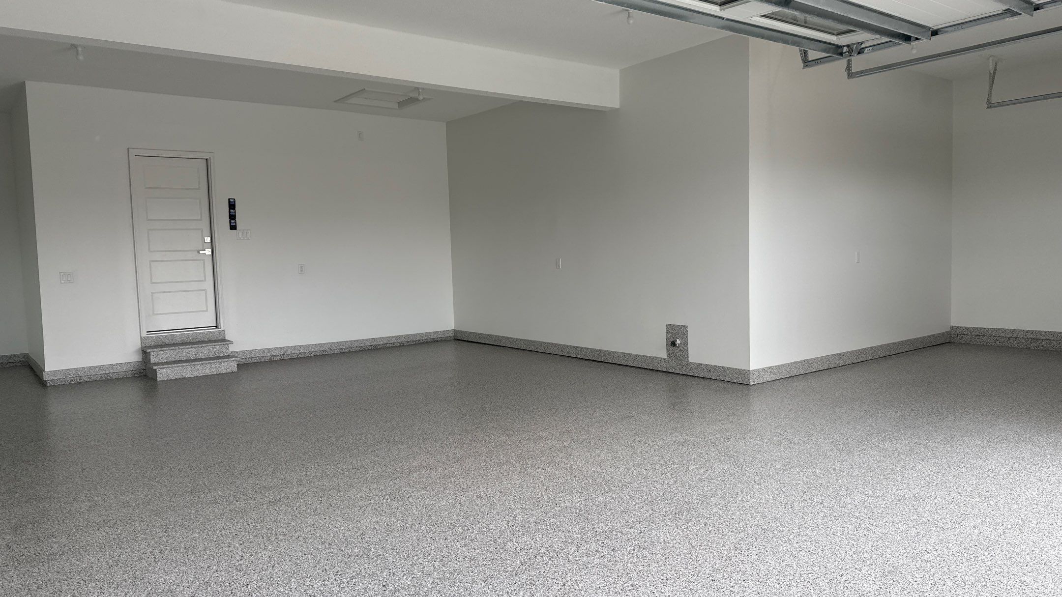 Christopher Has A Beautiful New Floor  by Banner Garage