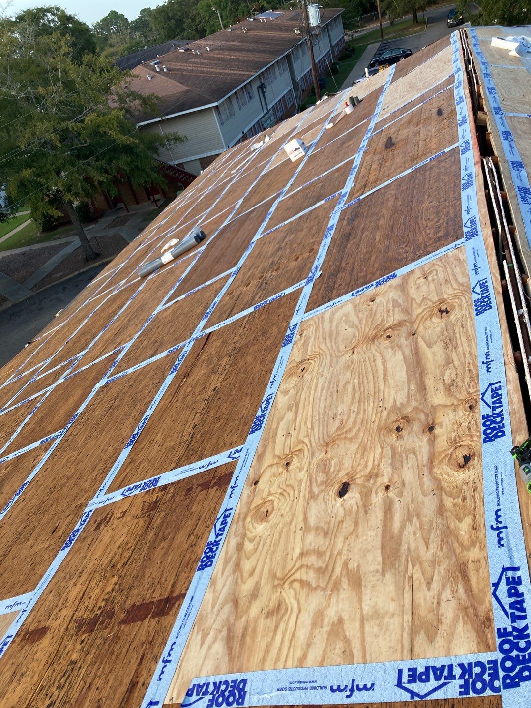 Residential Roofing Installation using Roof Replacement by American Roofing & Construction LLC