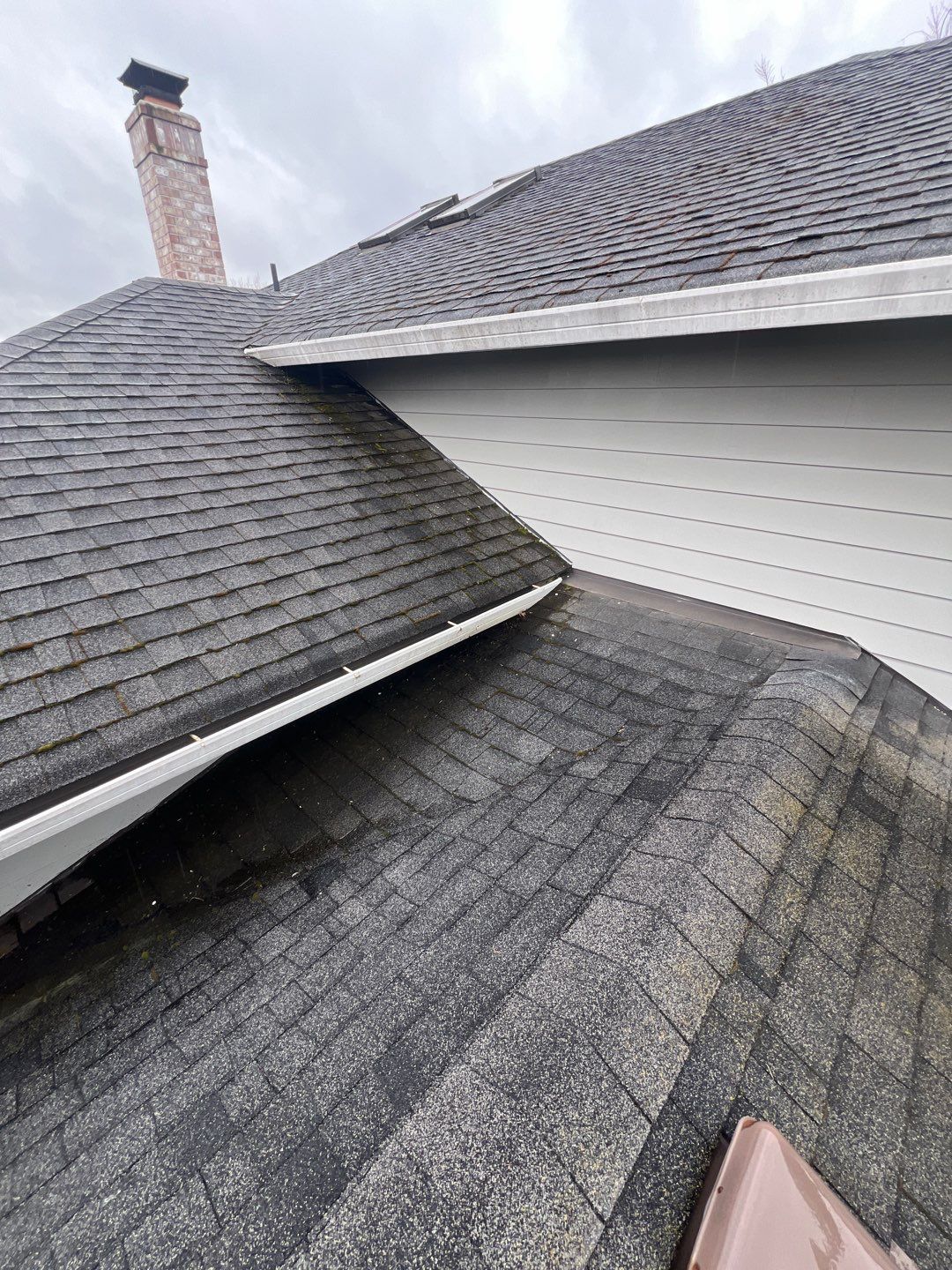 Residential Roofing Installation using IKO Dynasty (Color: Granite Black) by Orezona Building & Roofing Company, Inc.