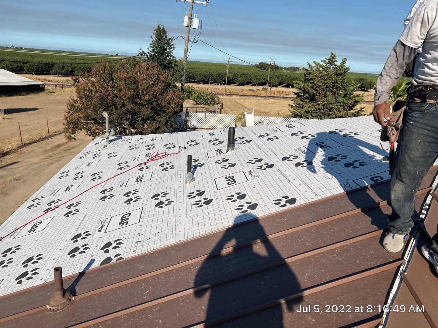 Metal roofing installation using Standing seam metal roofing system by Straight Edge Roofing Inc