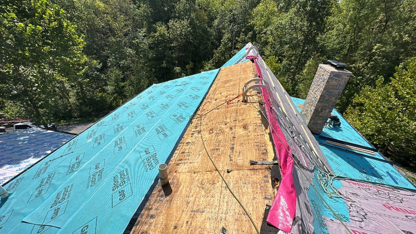 Residential Roofing Installation using Standing Seam Metal - Gallery Blue by RoofX 