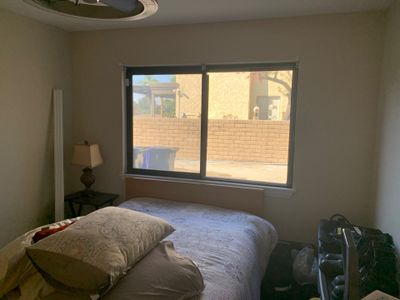 Window Installation using black Vinyl Windows