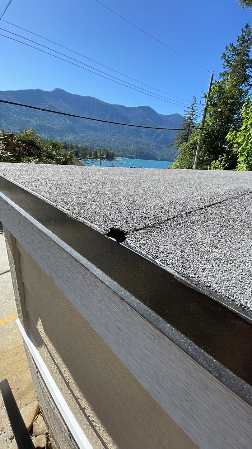 Small patio roof with 2ply sbs  by Top Notch Roofing Inc