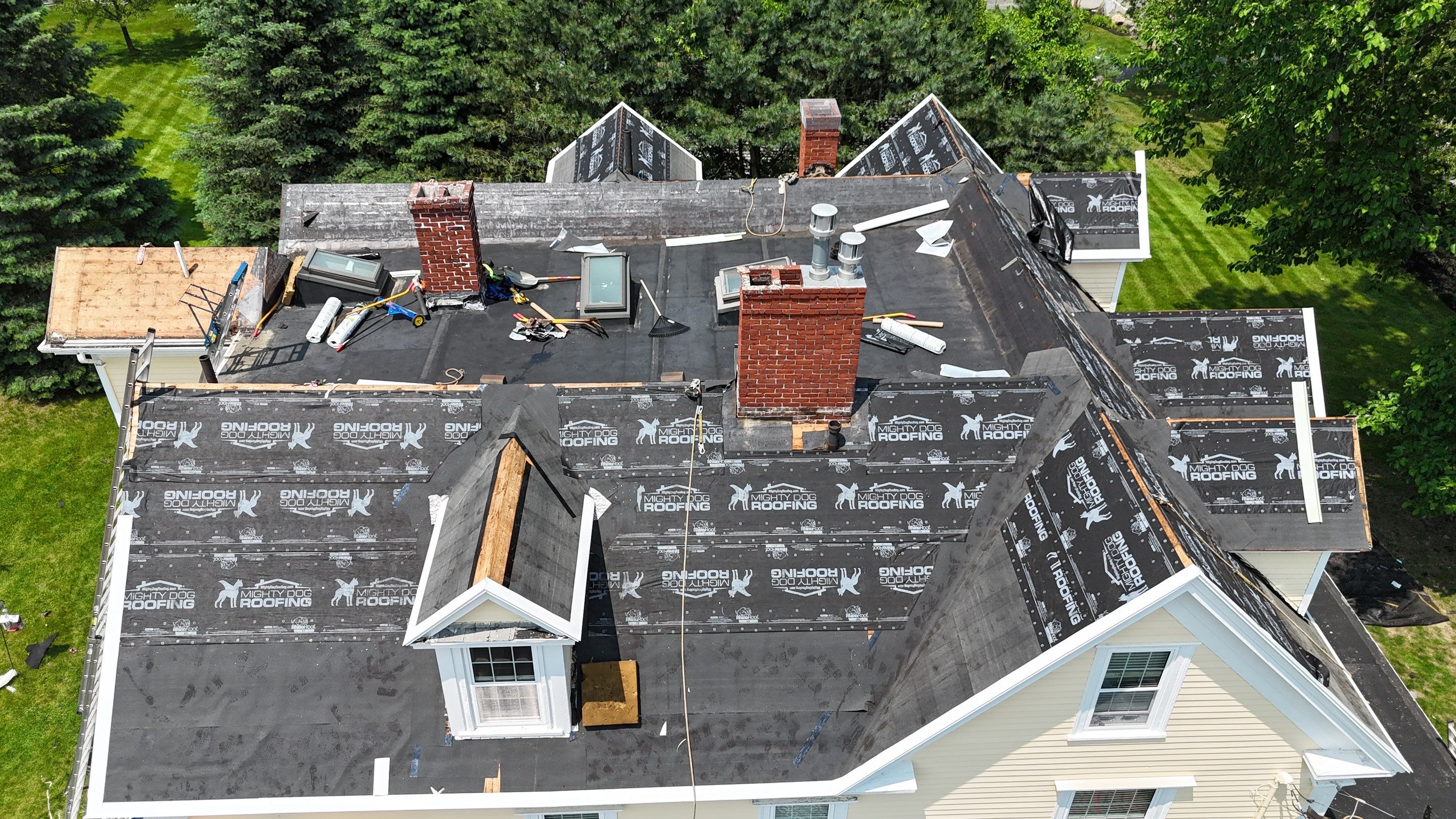 Full Roof Replacement & EPDM Restoration – North Andover, MA by Mighty Dog Roofing of Greater Middlesex County