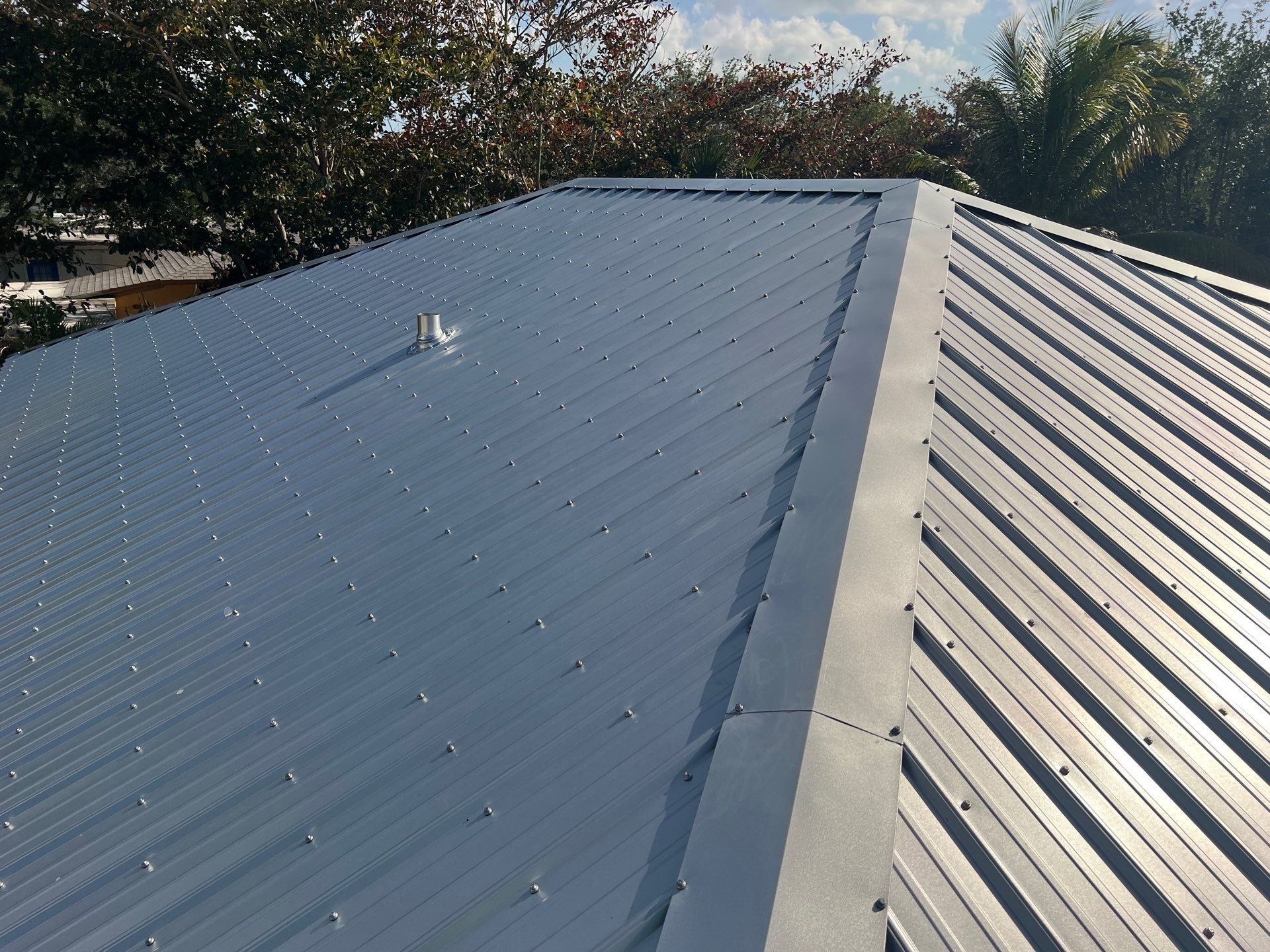 Residential Roofing Installation using Durabull Classic Rib Panel by Durabilis Roofing INC